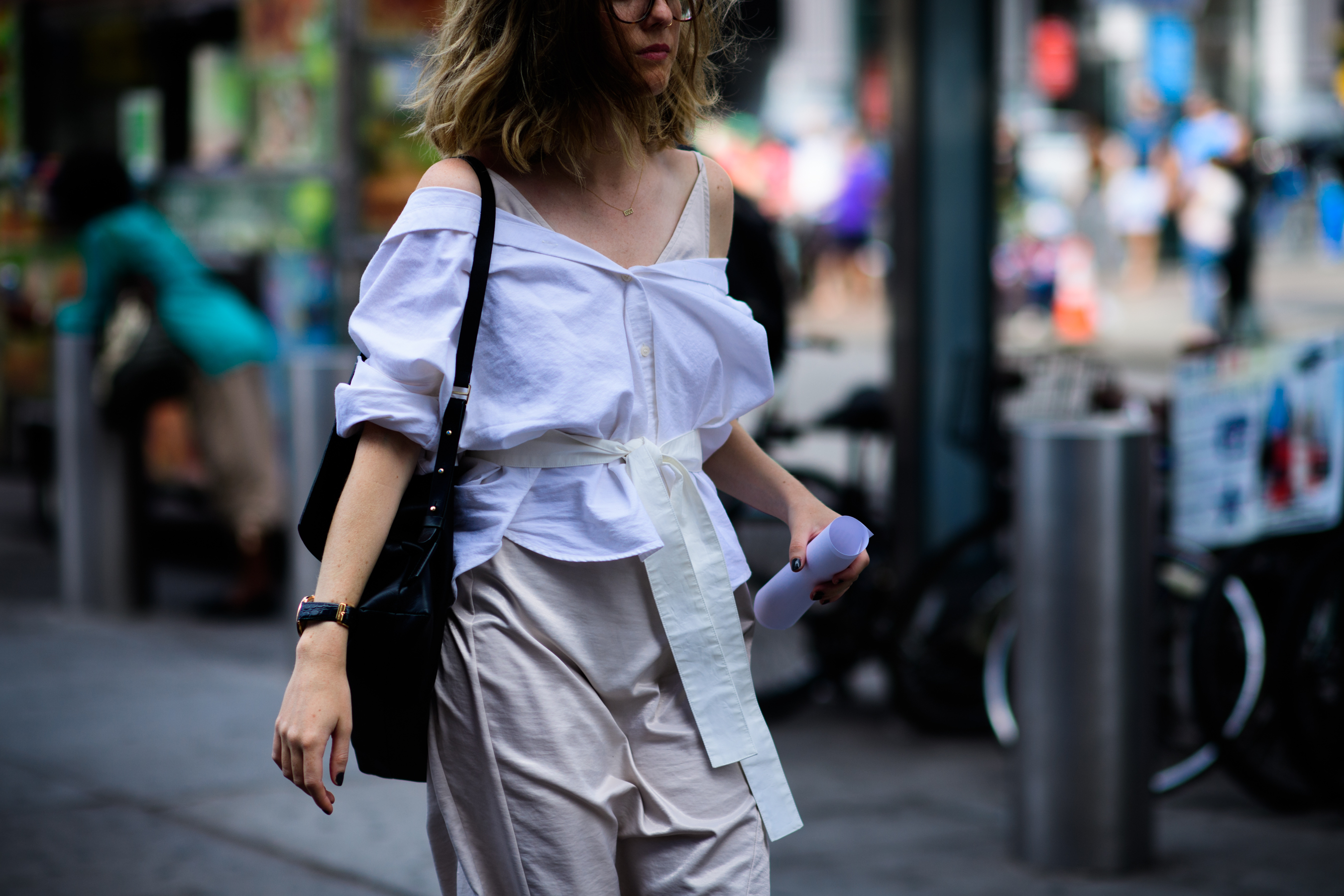 Woman wearing white and beige outfit