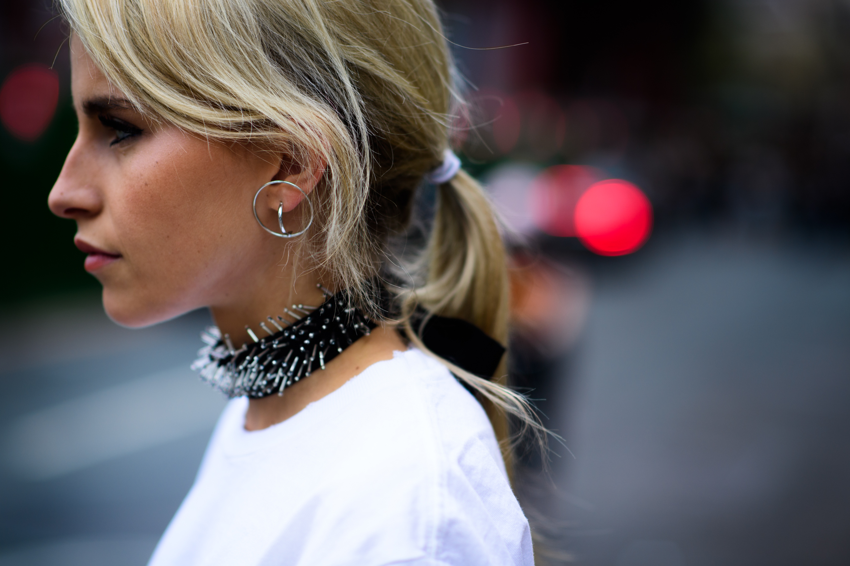 Woman wearing aggressive style choker