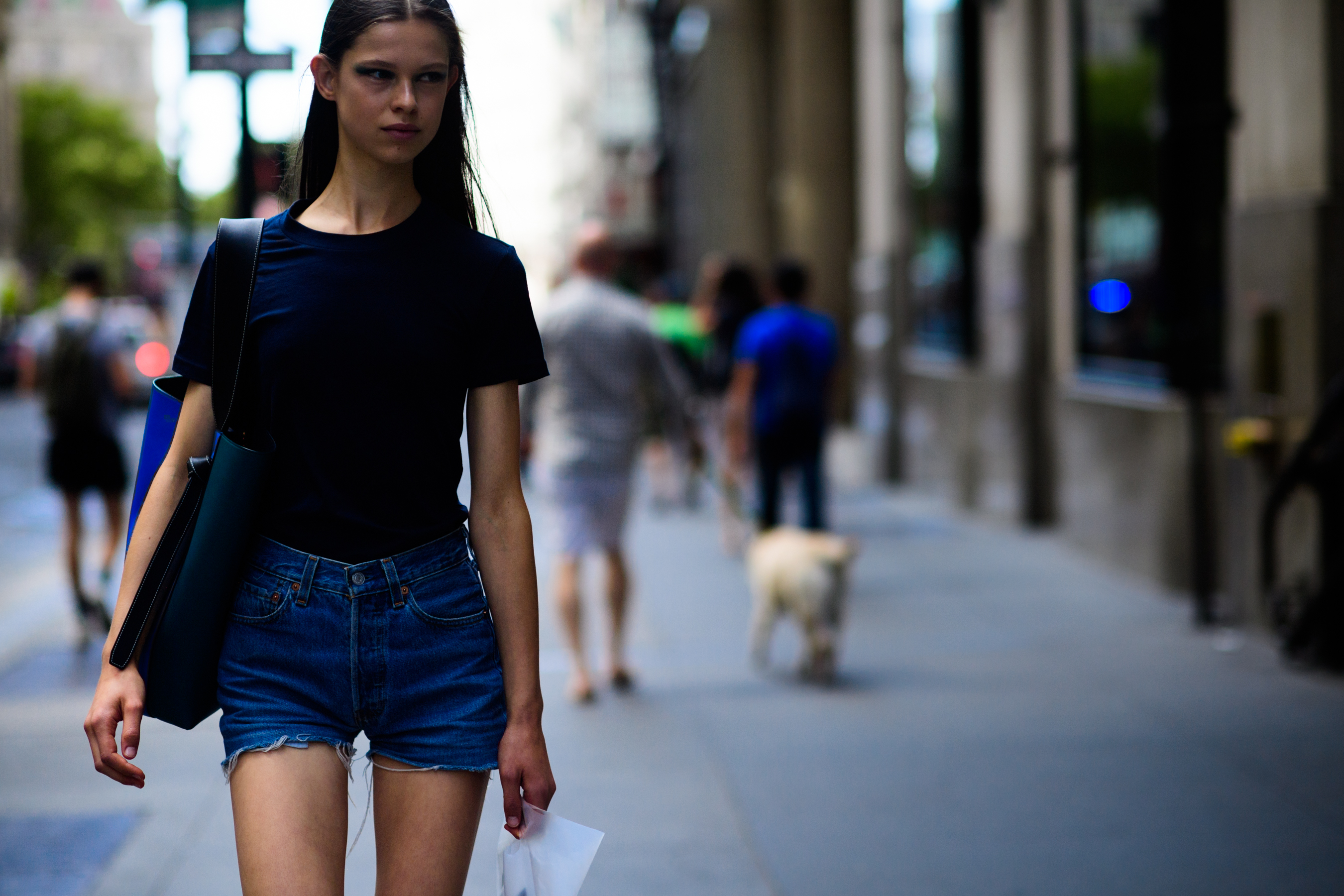 Model wearing denim shorts