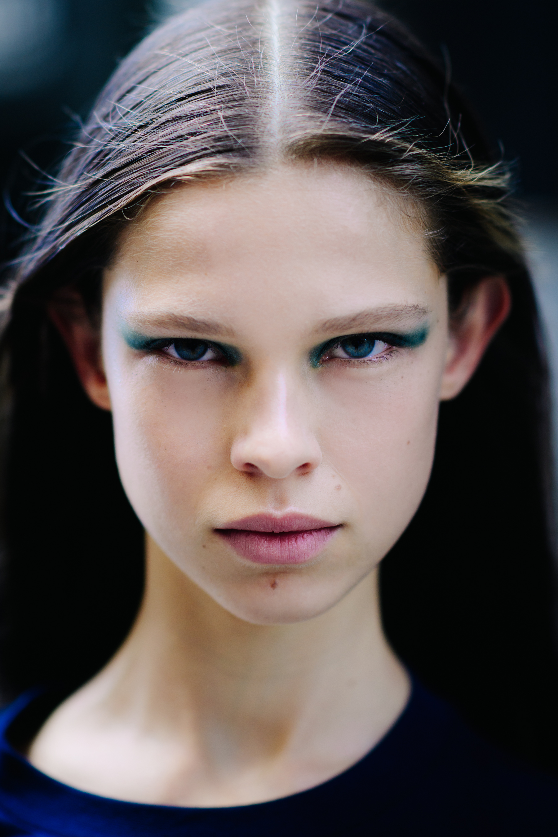 Portrait of a model with green make up