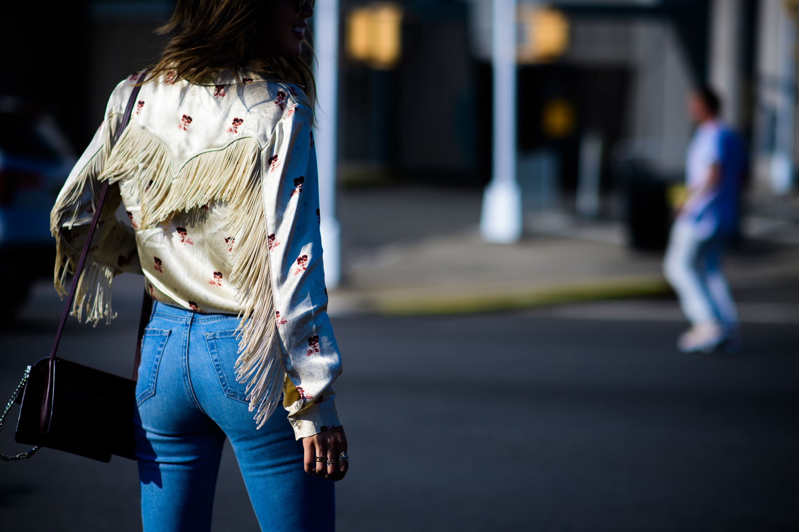 Blogger wearing jacket with ruffles