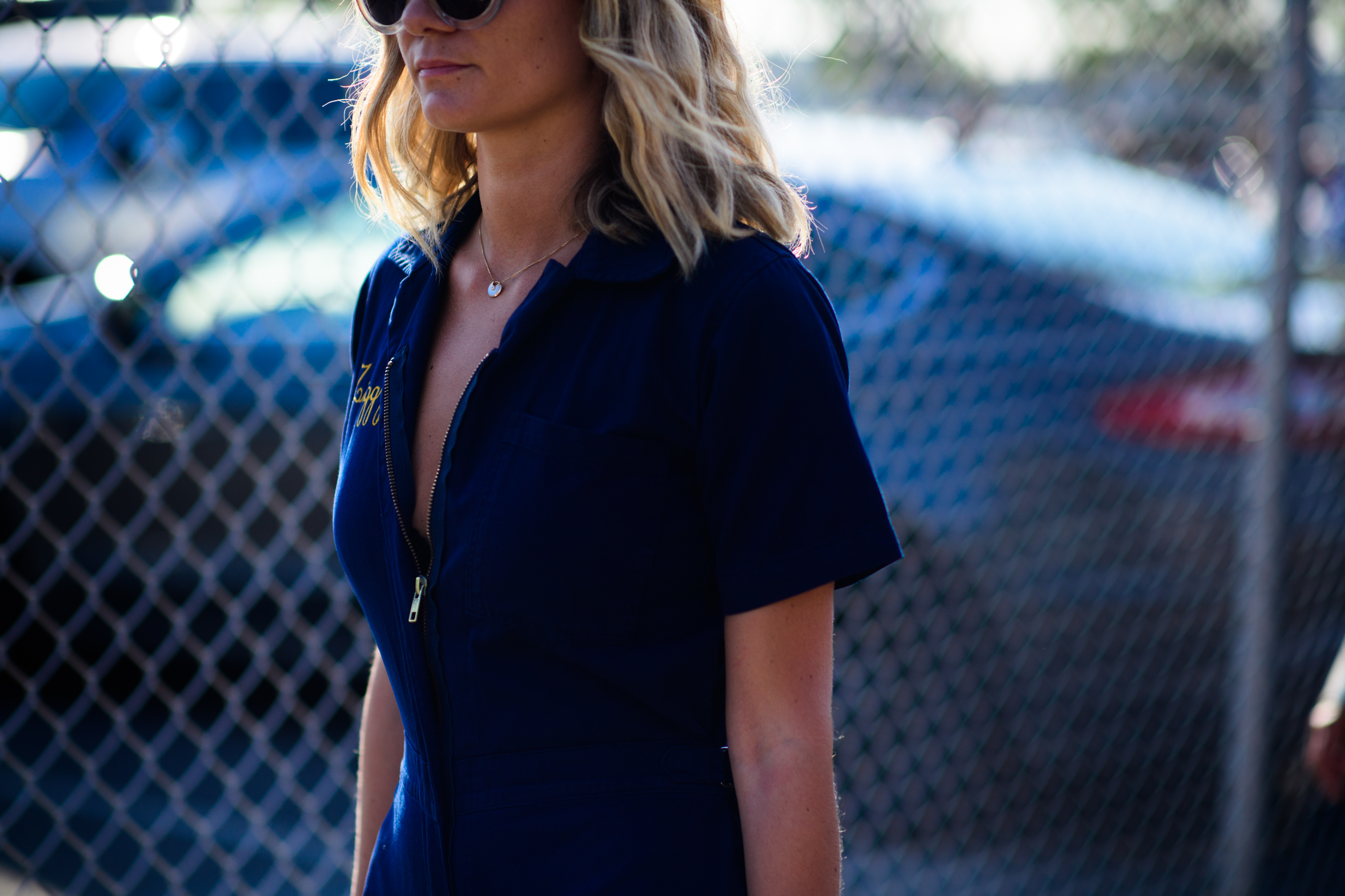Woman wearing blue jumpsuit