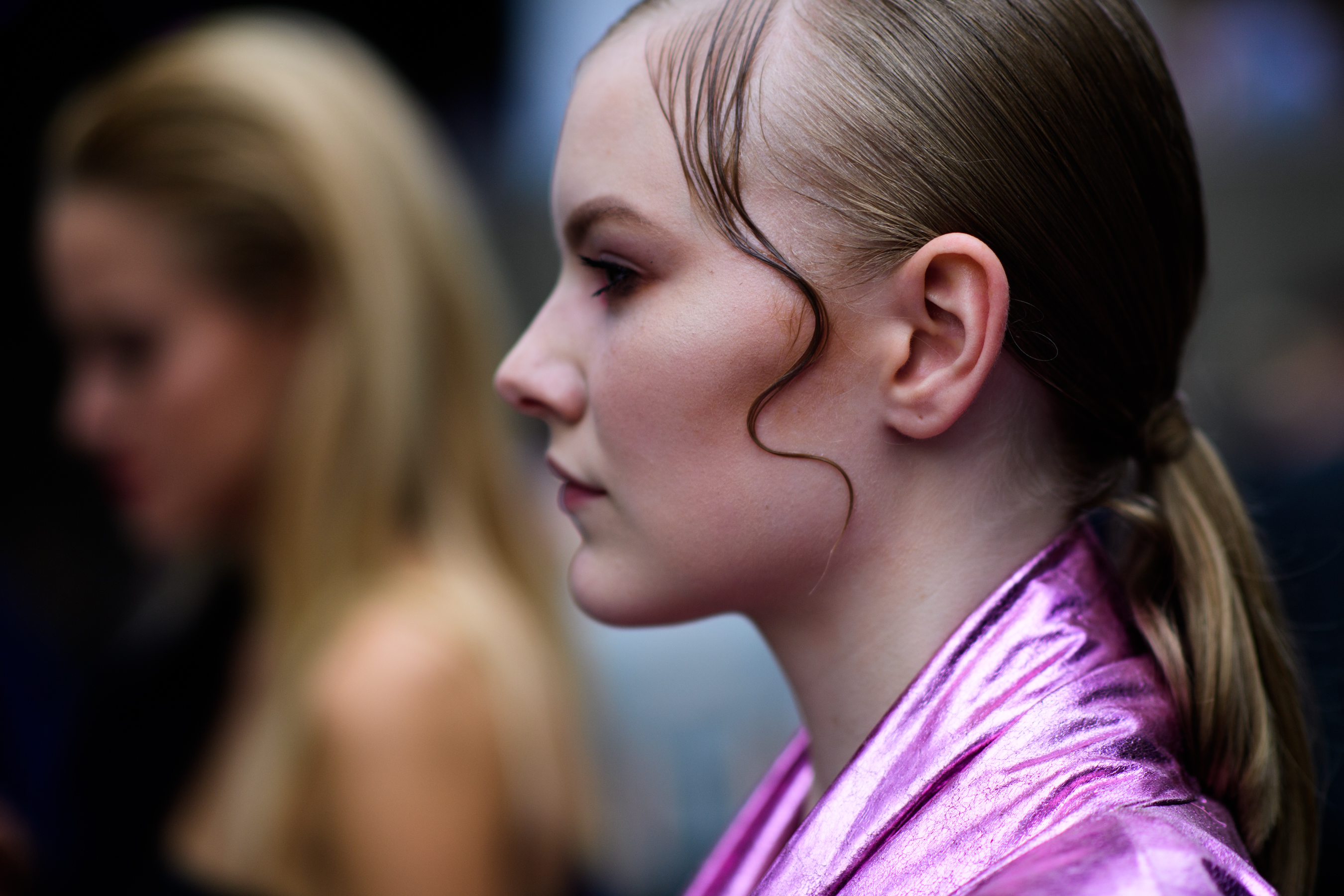 Woman wearing bright pink outfit