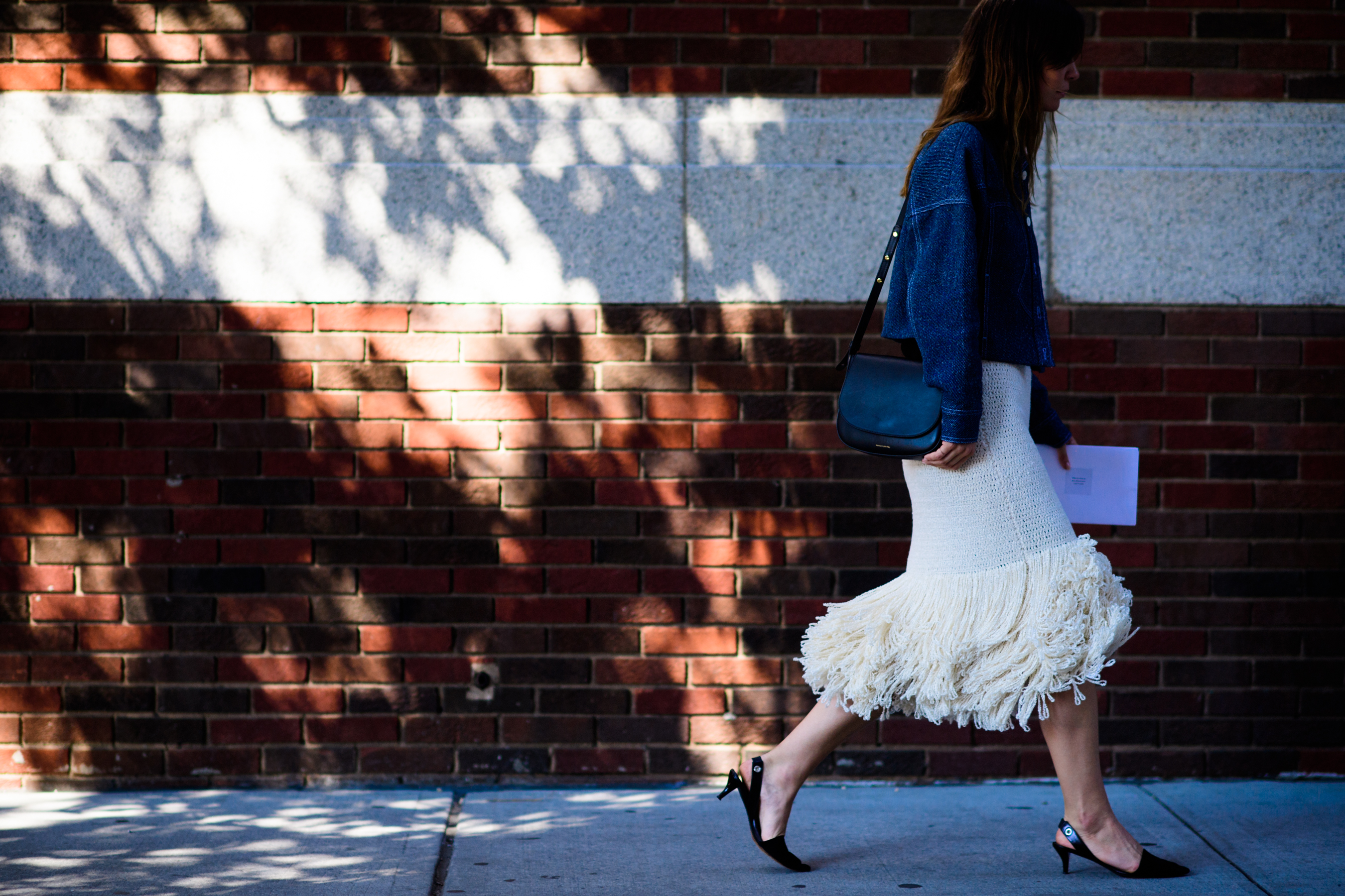 American stylist wearing denim jacket