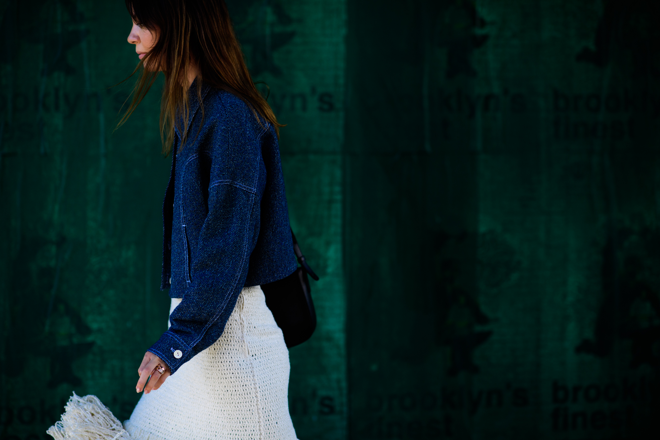 American stylist wearing denim jacket