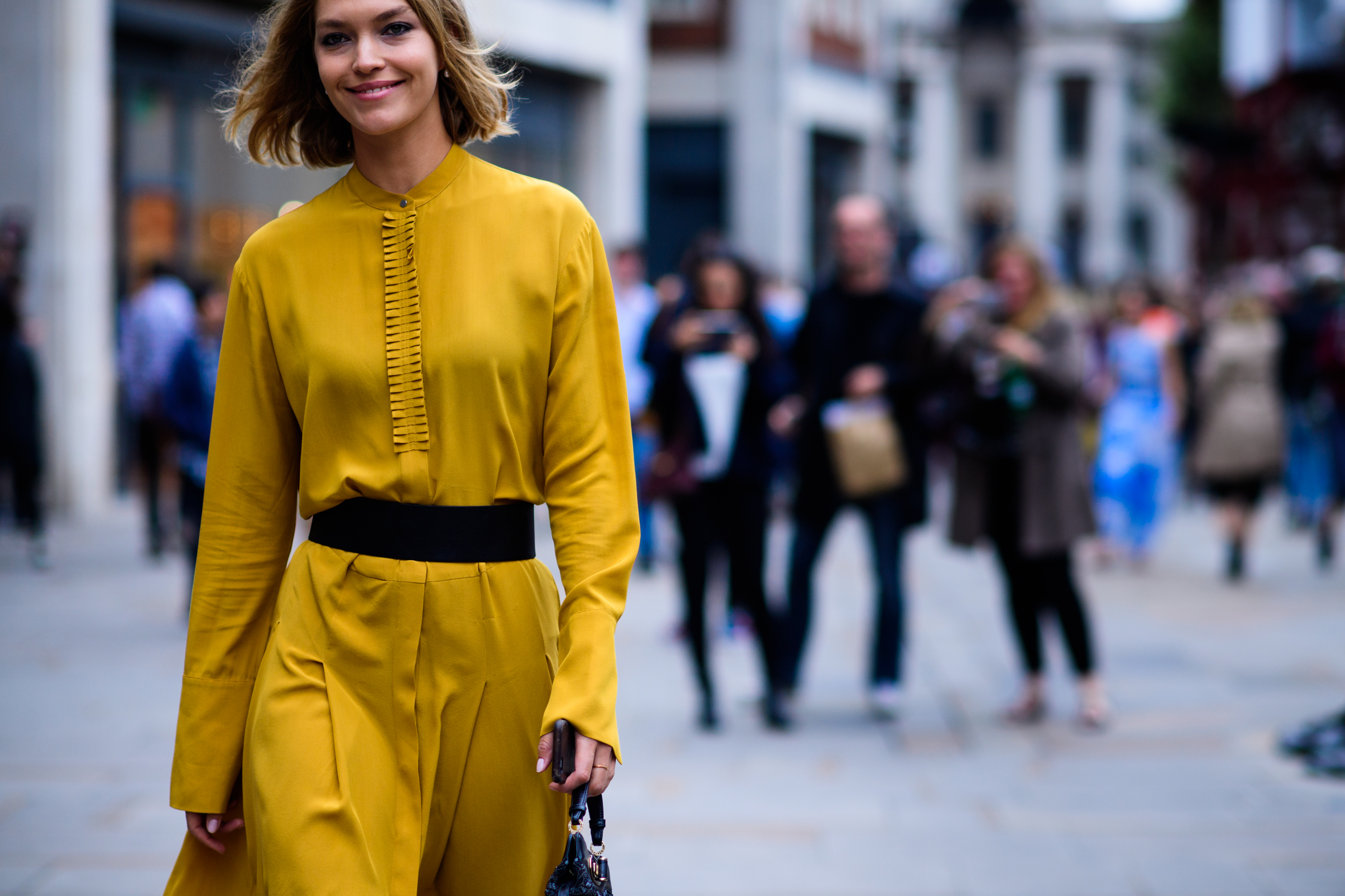 Model wearing yellow dress