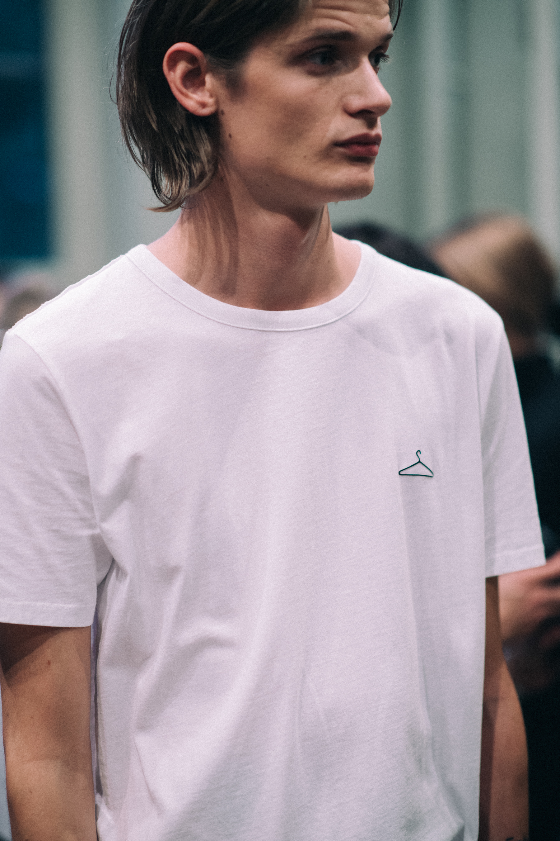Male model dressed before the show