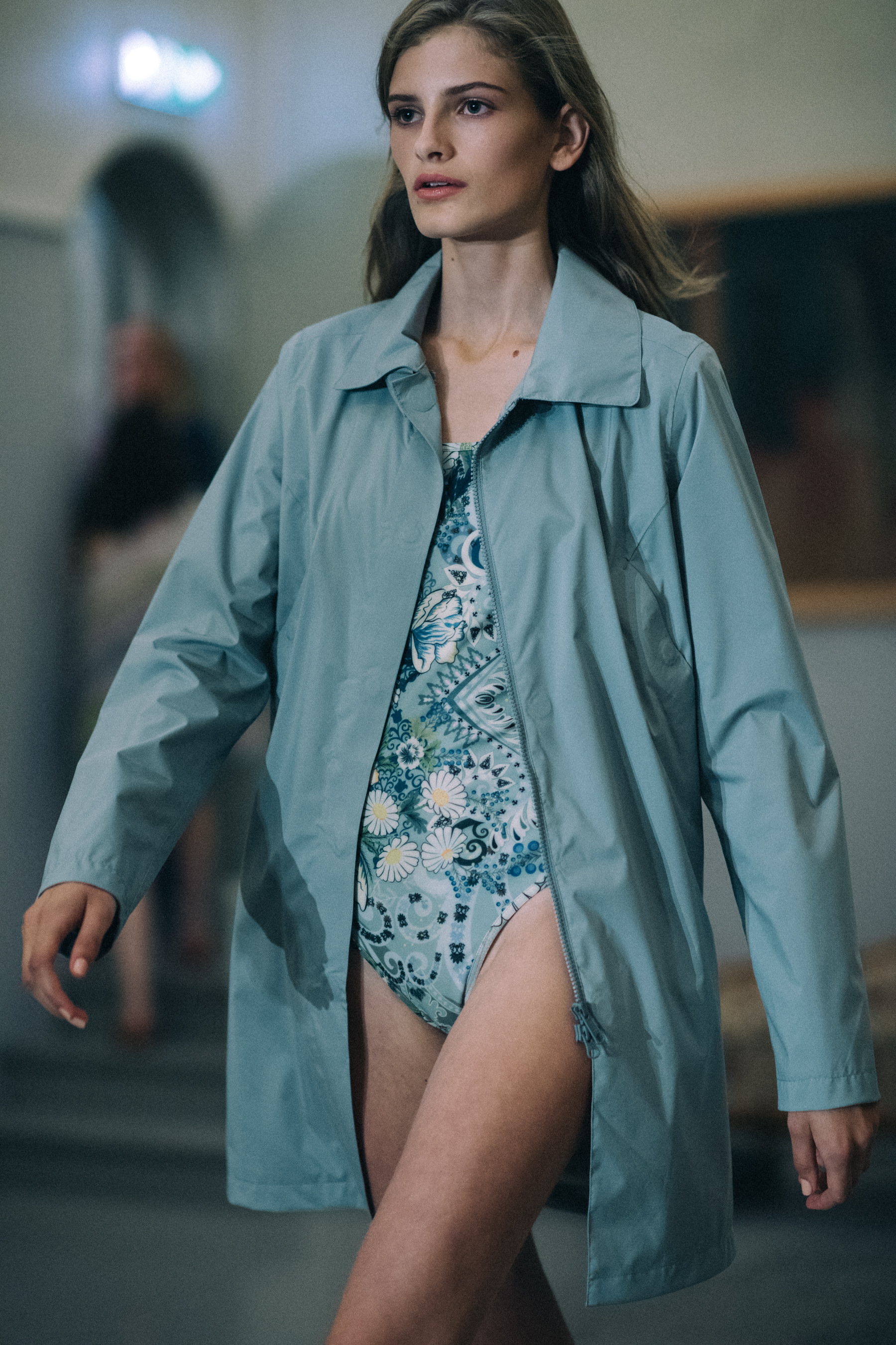 Model walking on the runway