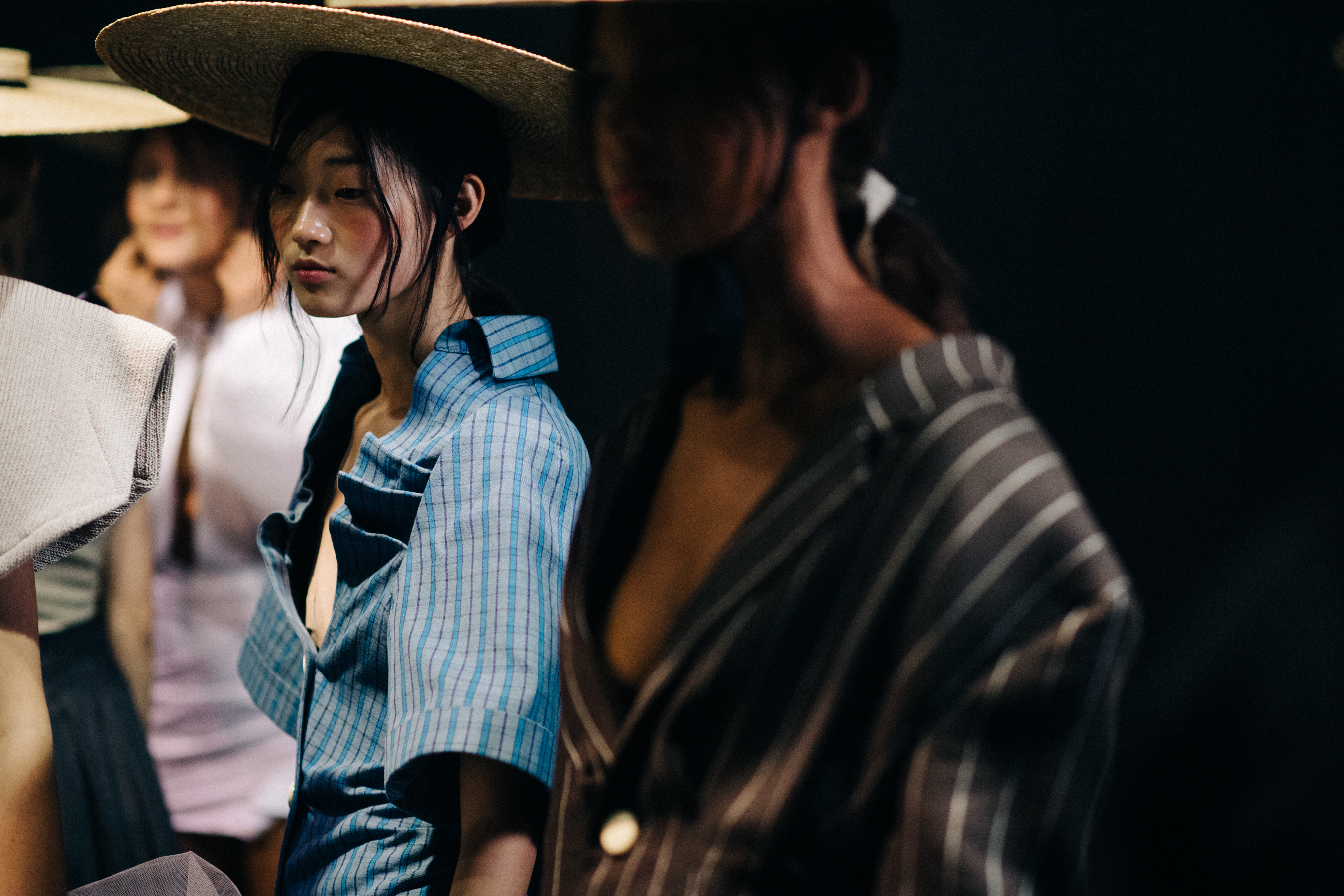 Model wearing blue shirt dress