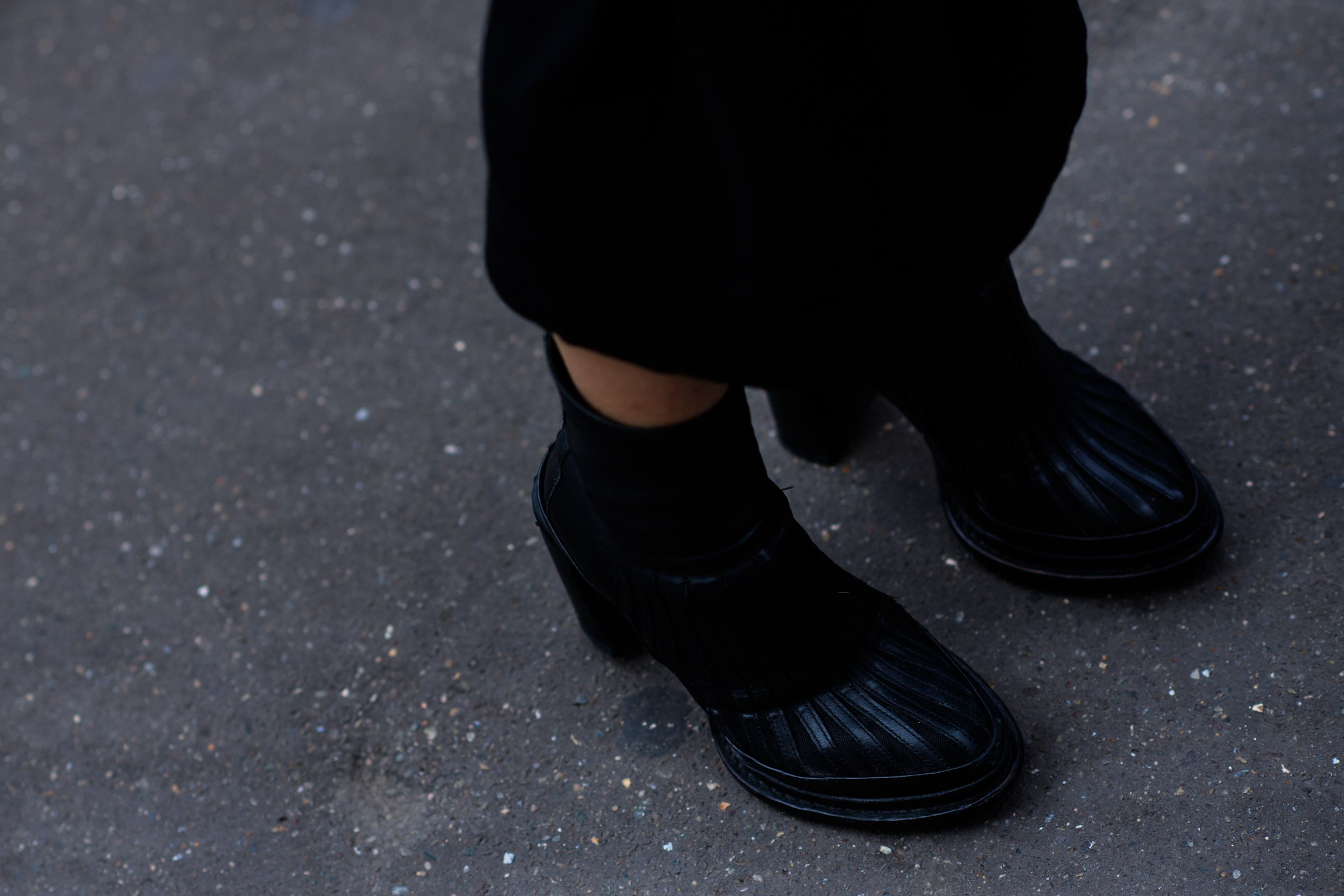 Woman wearing black shoes