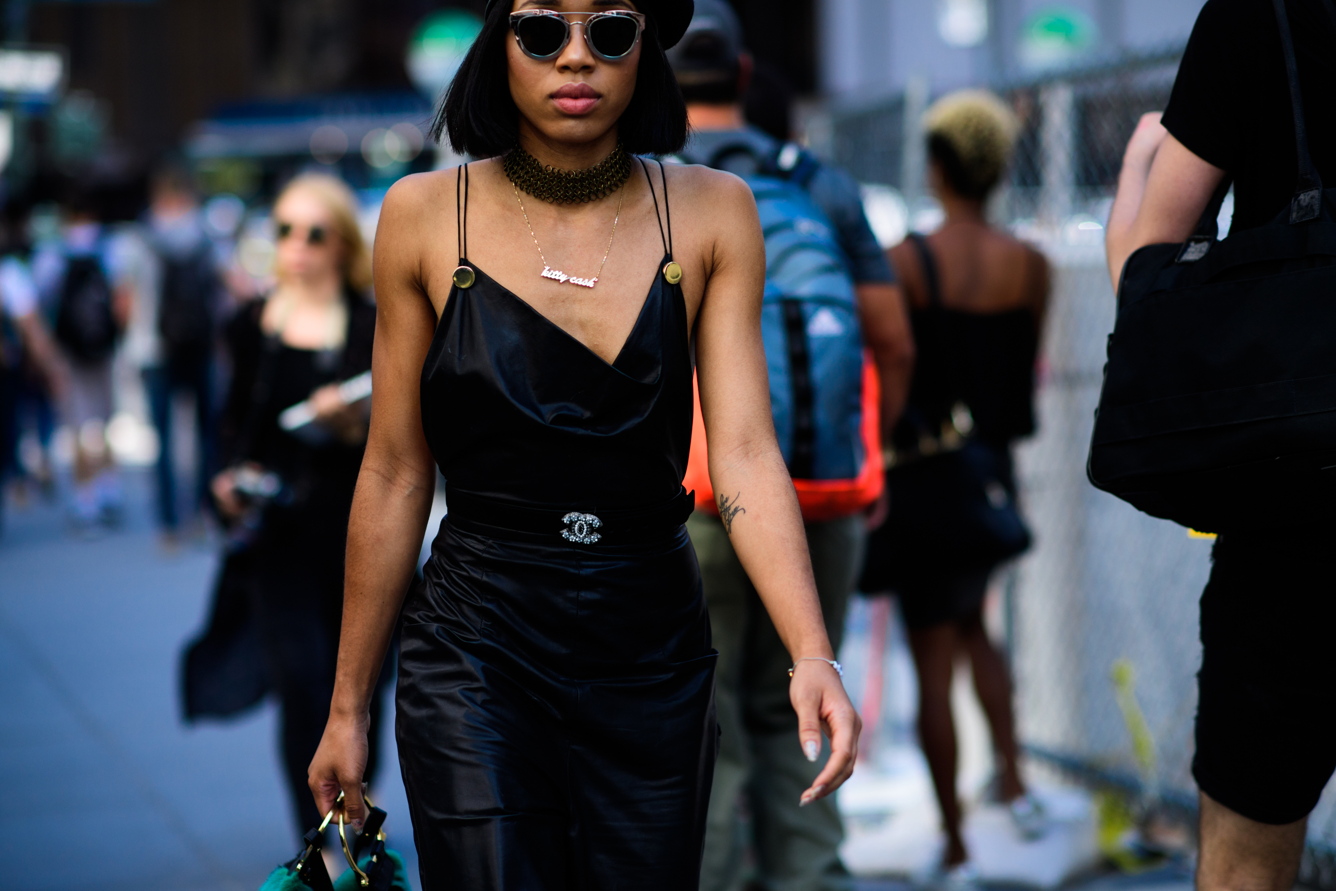 Woman wearing black leather dress