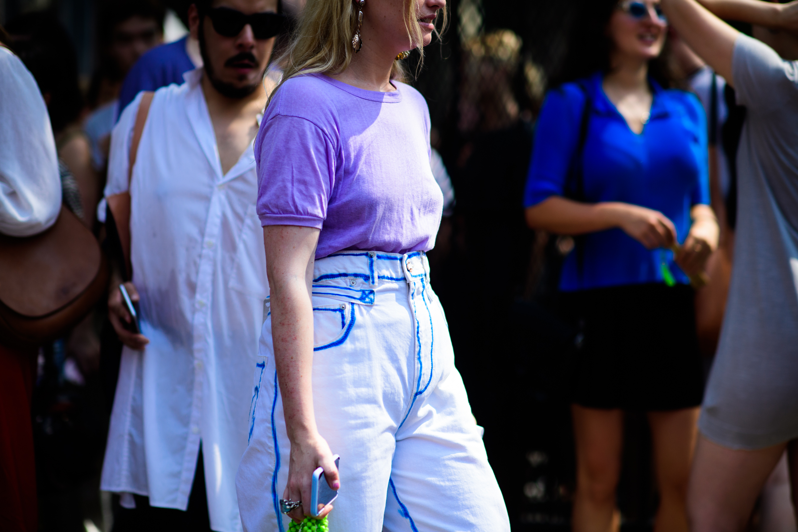 Woman wears Alex Mullins jeans