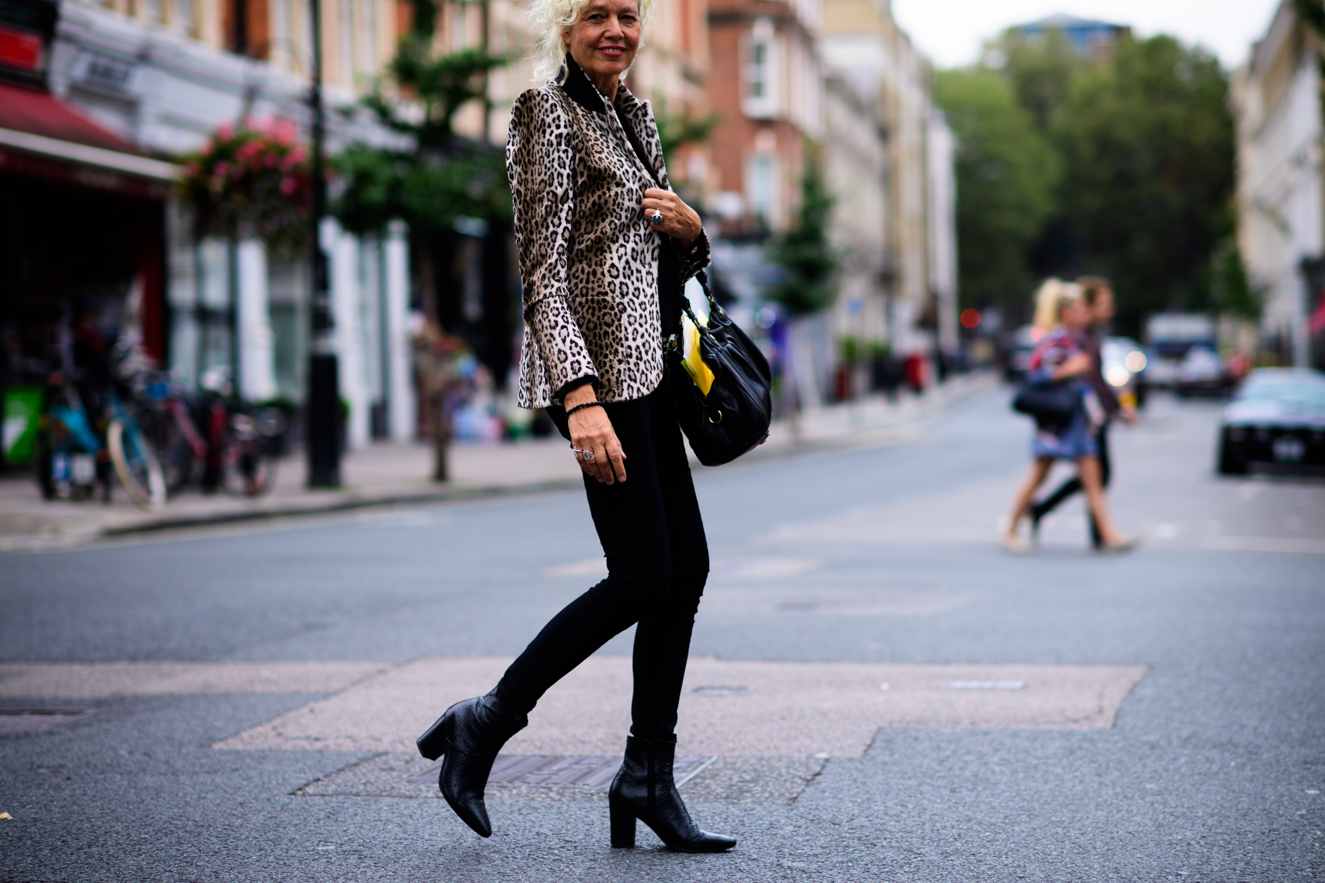 German photographer wearing leopard blazer