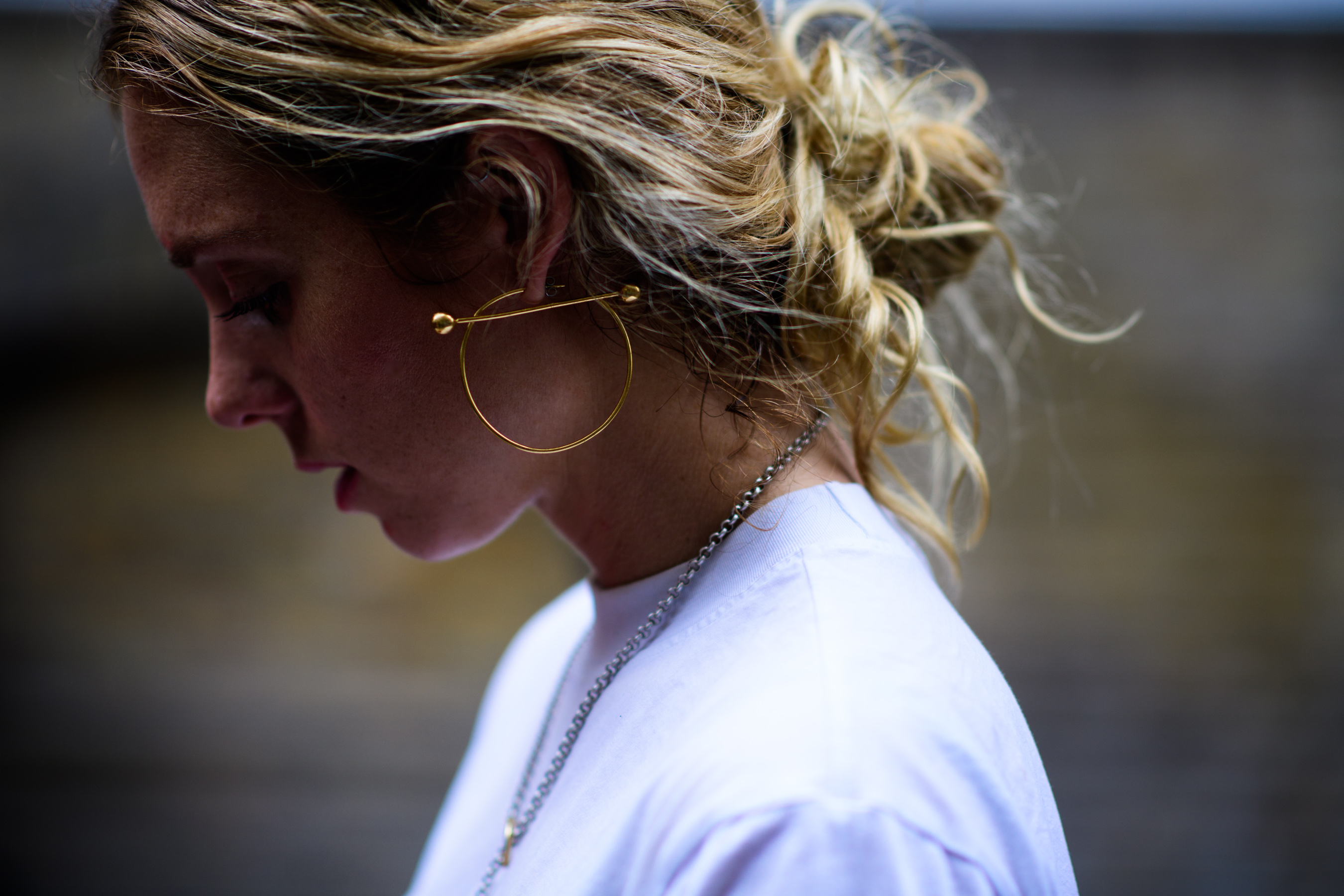Woman wearing golden earring