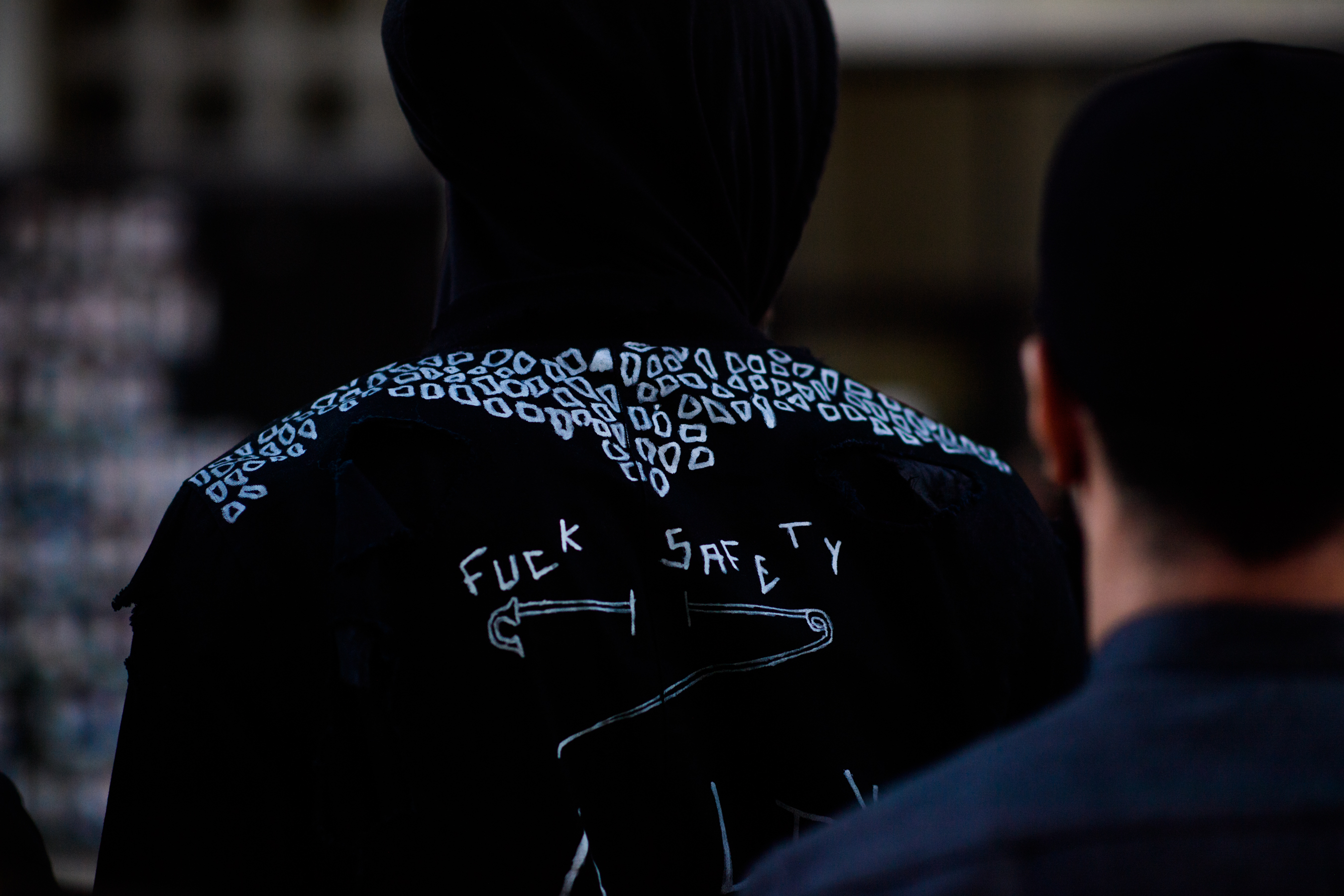 Man wearing hoodie with print