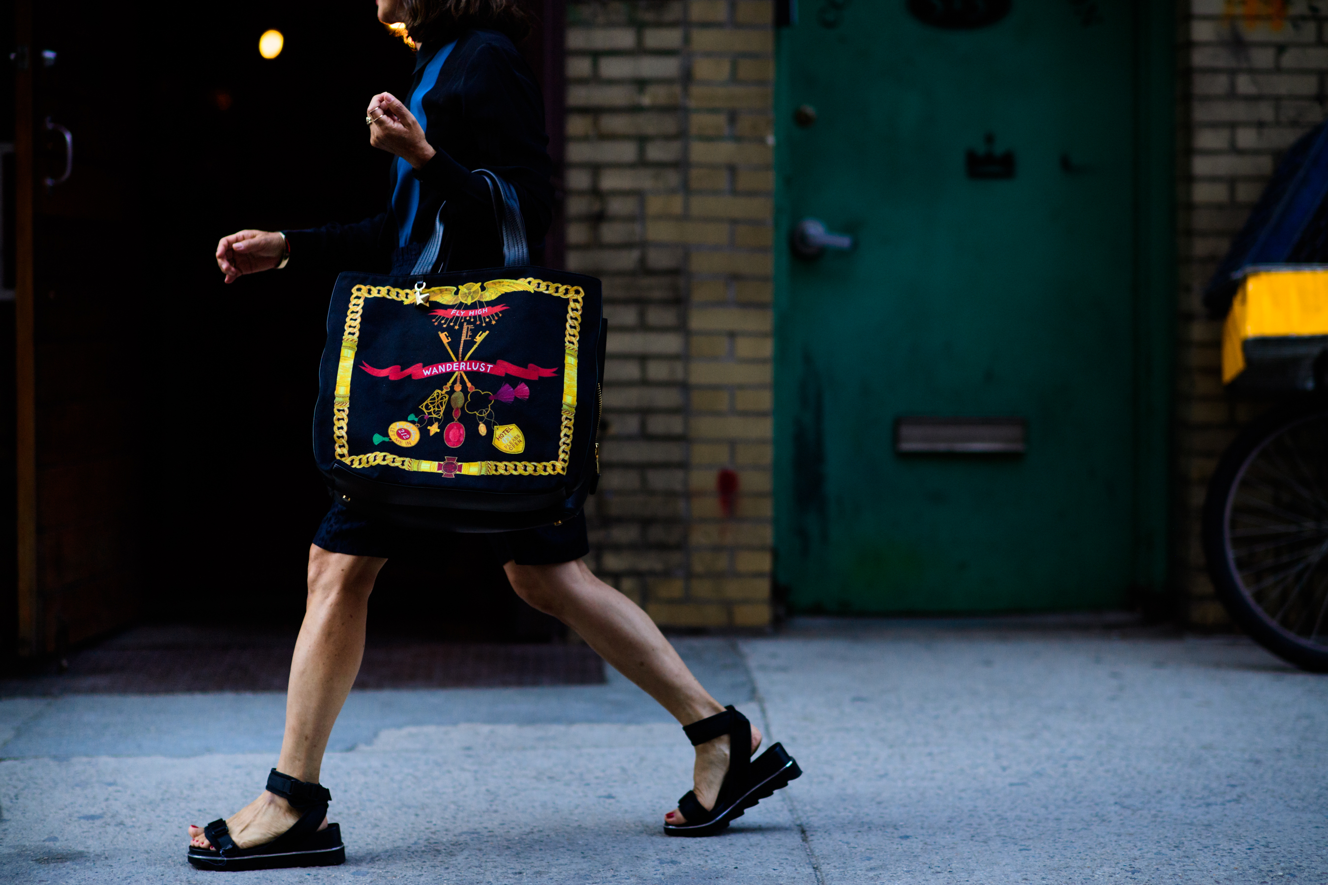 Woman with big colourful bag