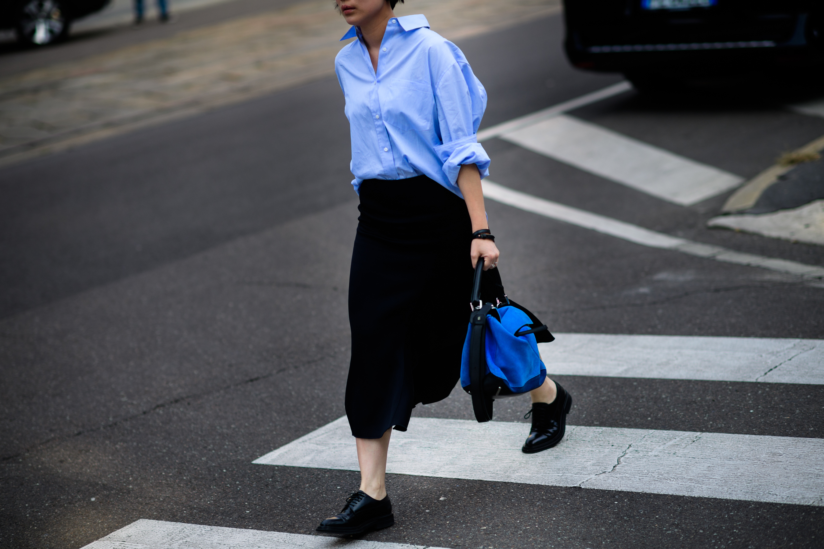 Woman with blue Loewe bag