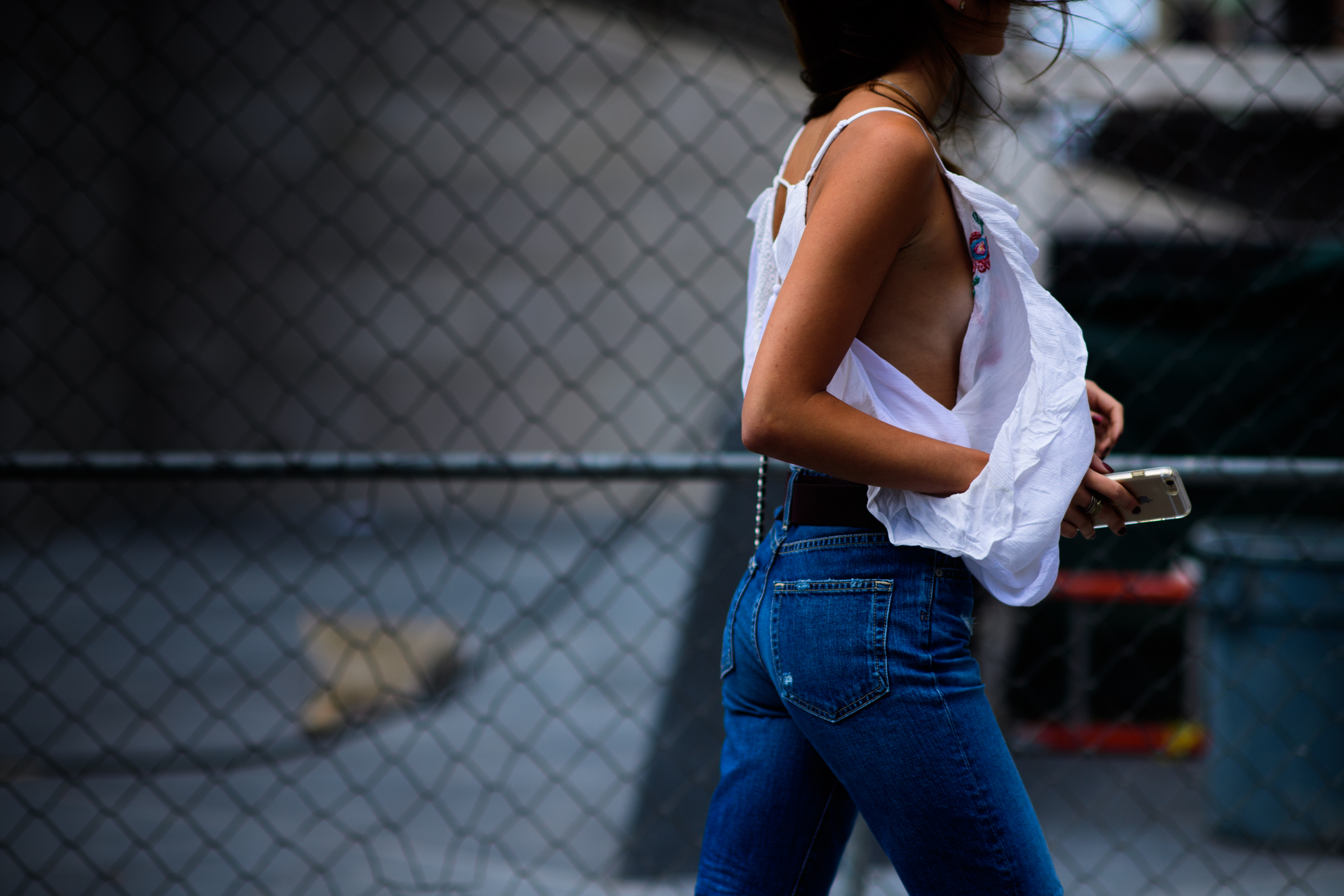 Woman wearing denim and white