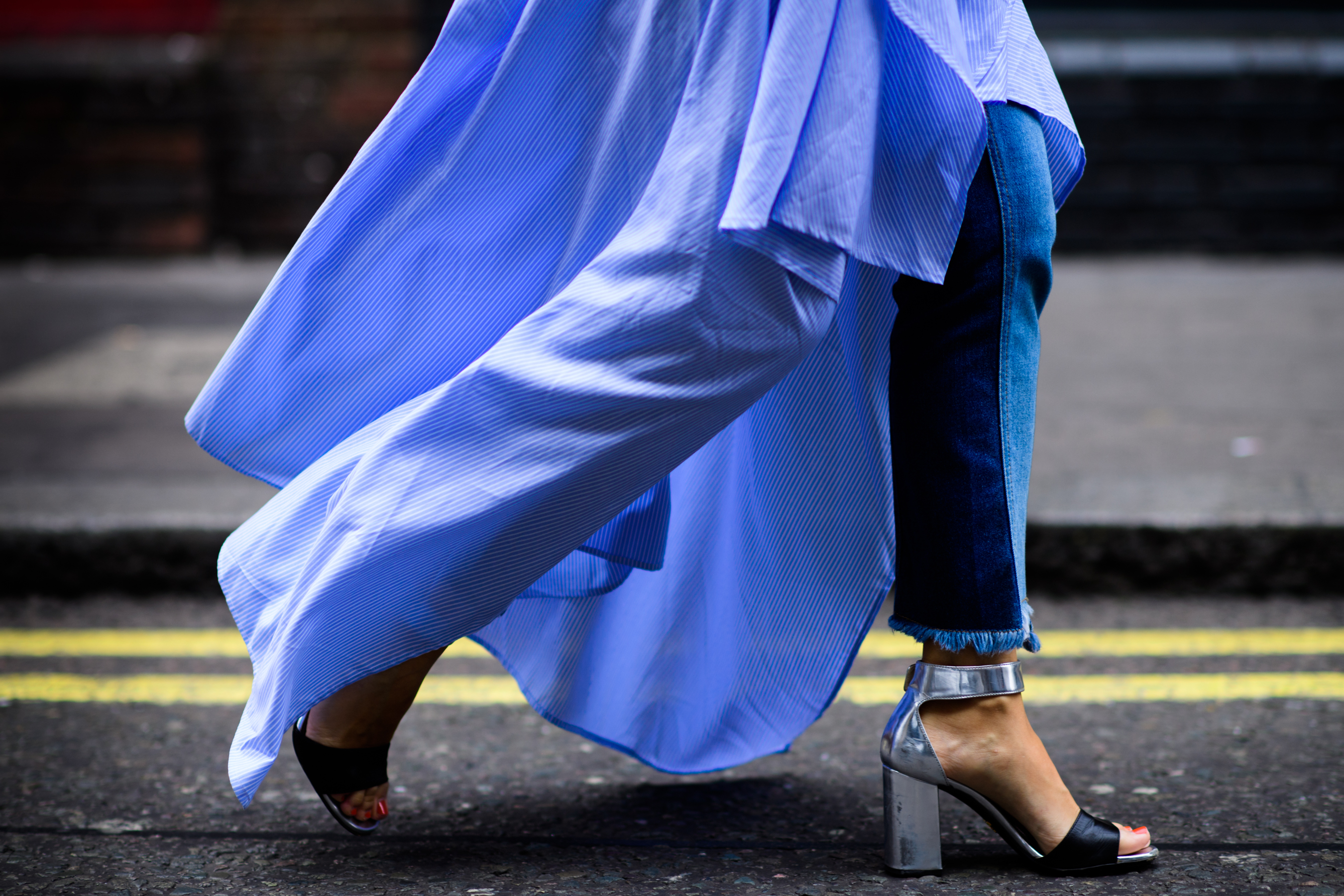 Woman wearing blue shirt dress
