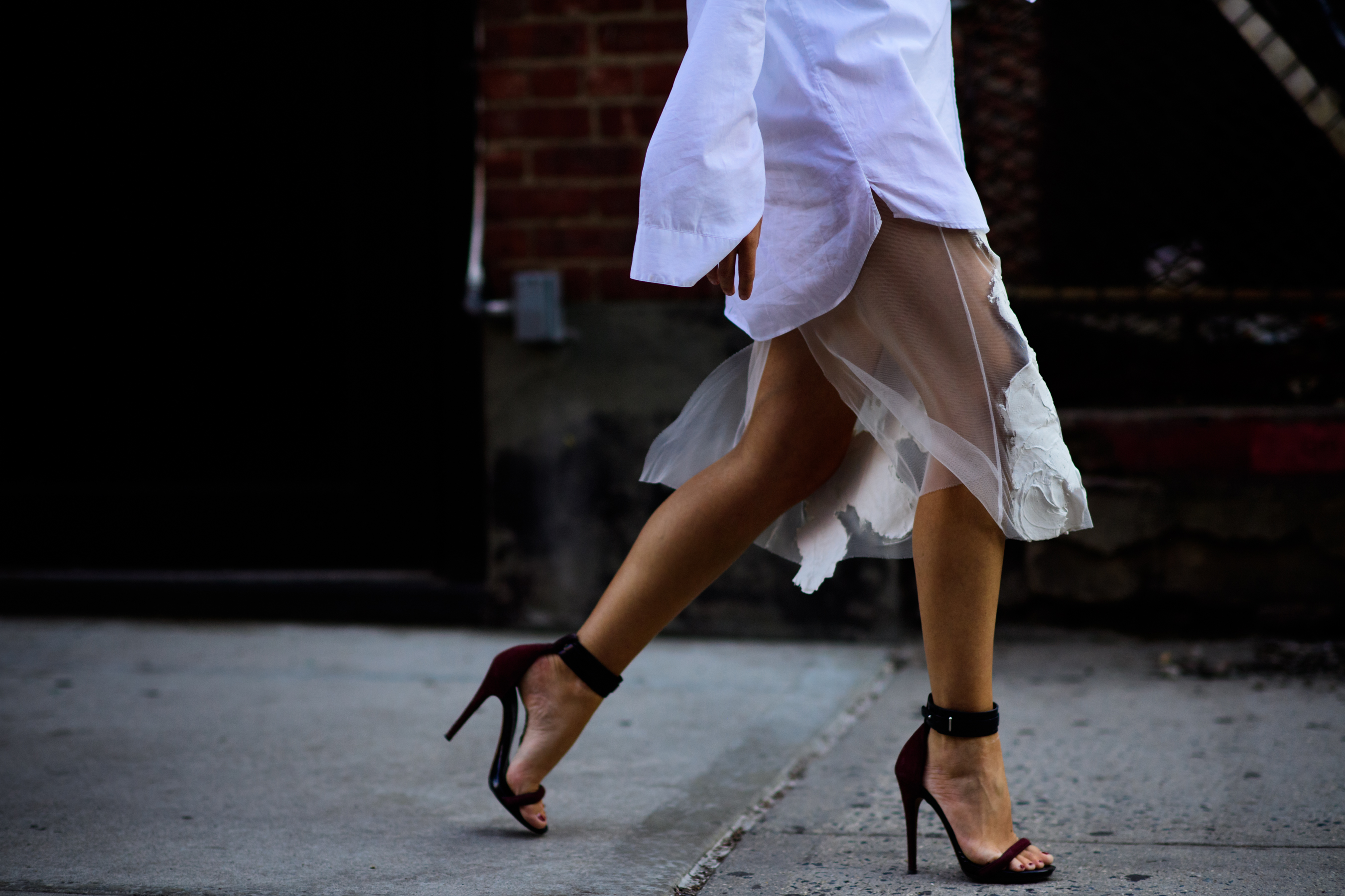 W Magazine editor wearing white skirt