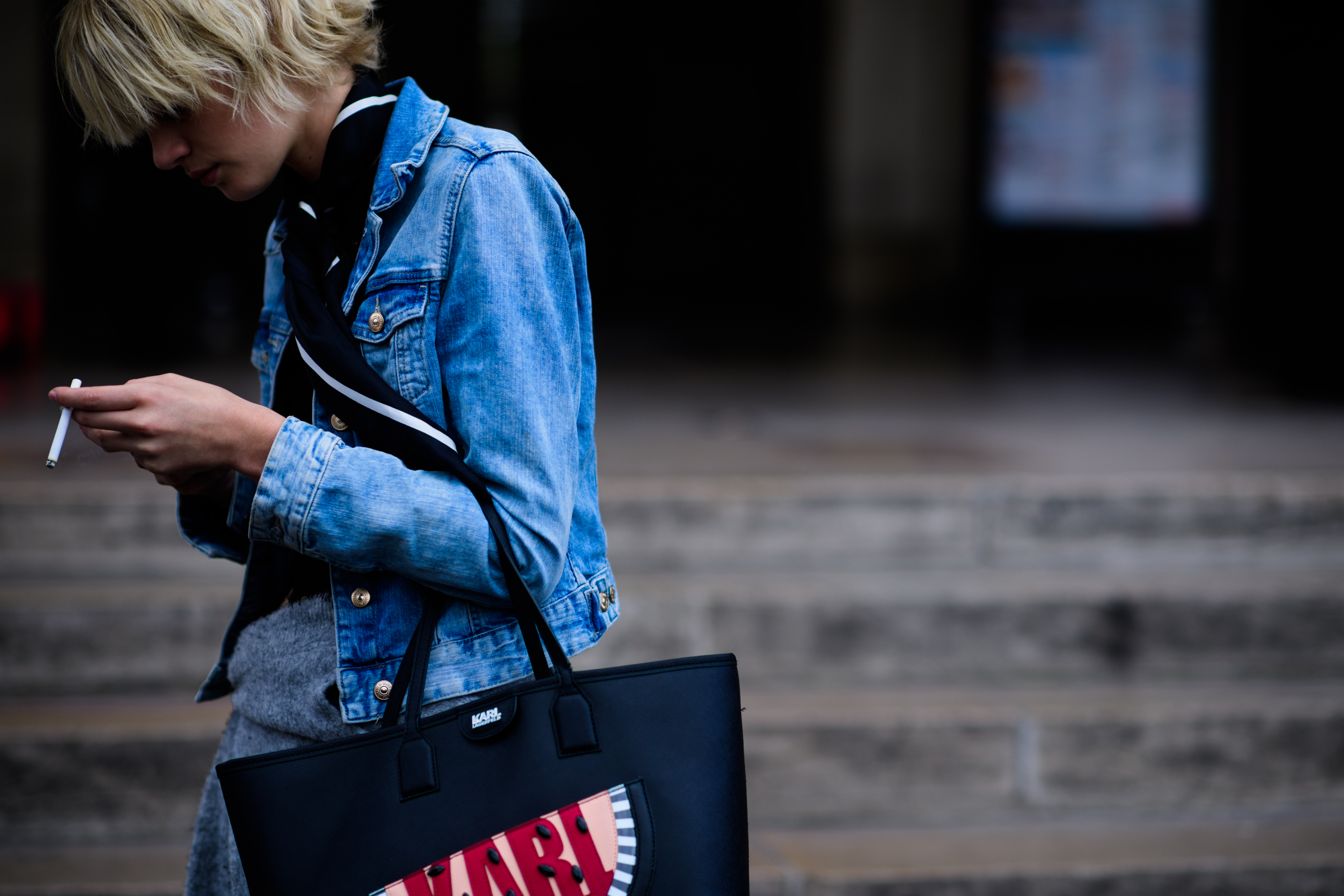 Model wearing blue denim jacket