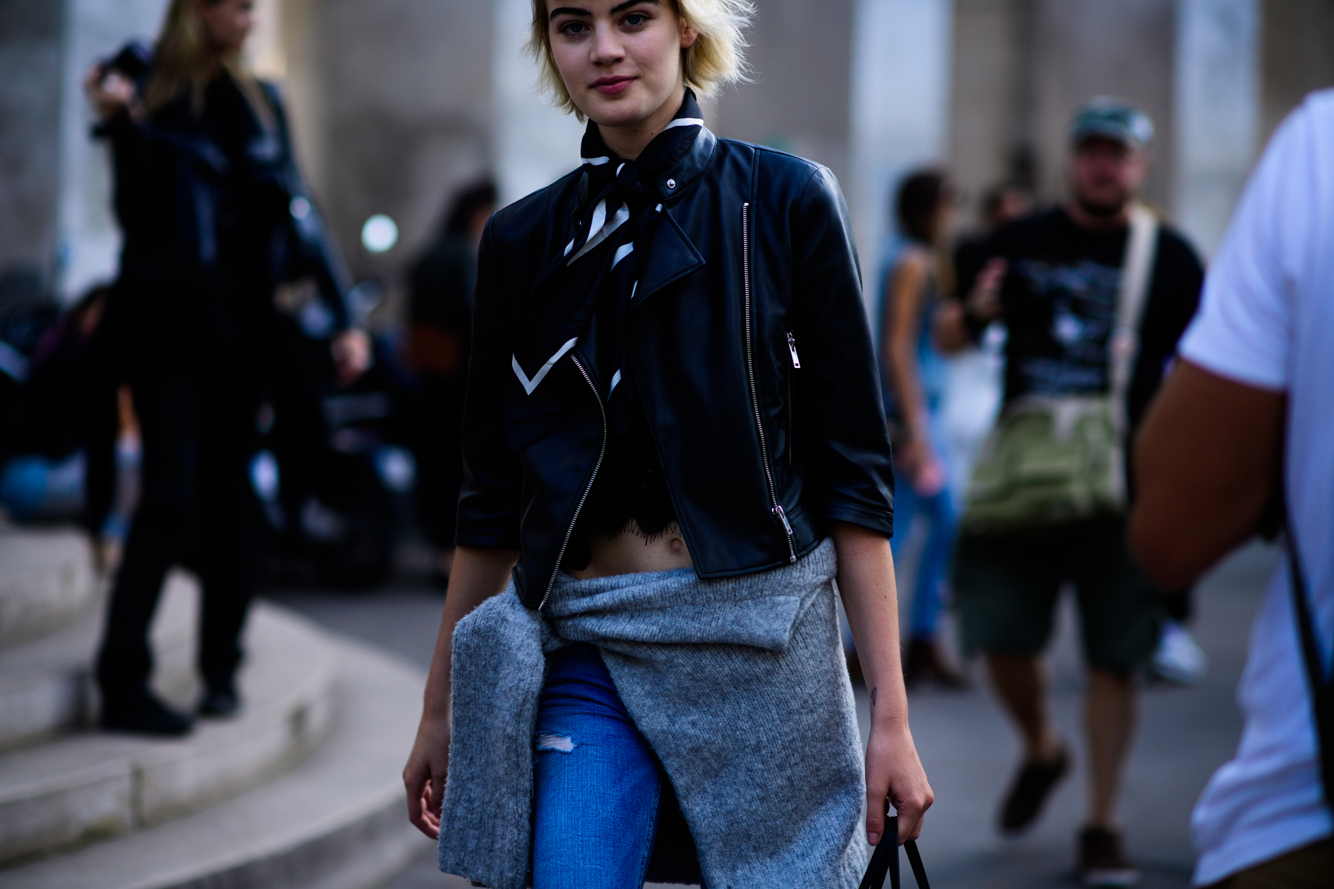 Model wearing leather jacket after show