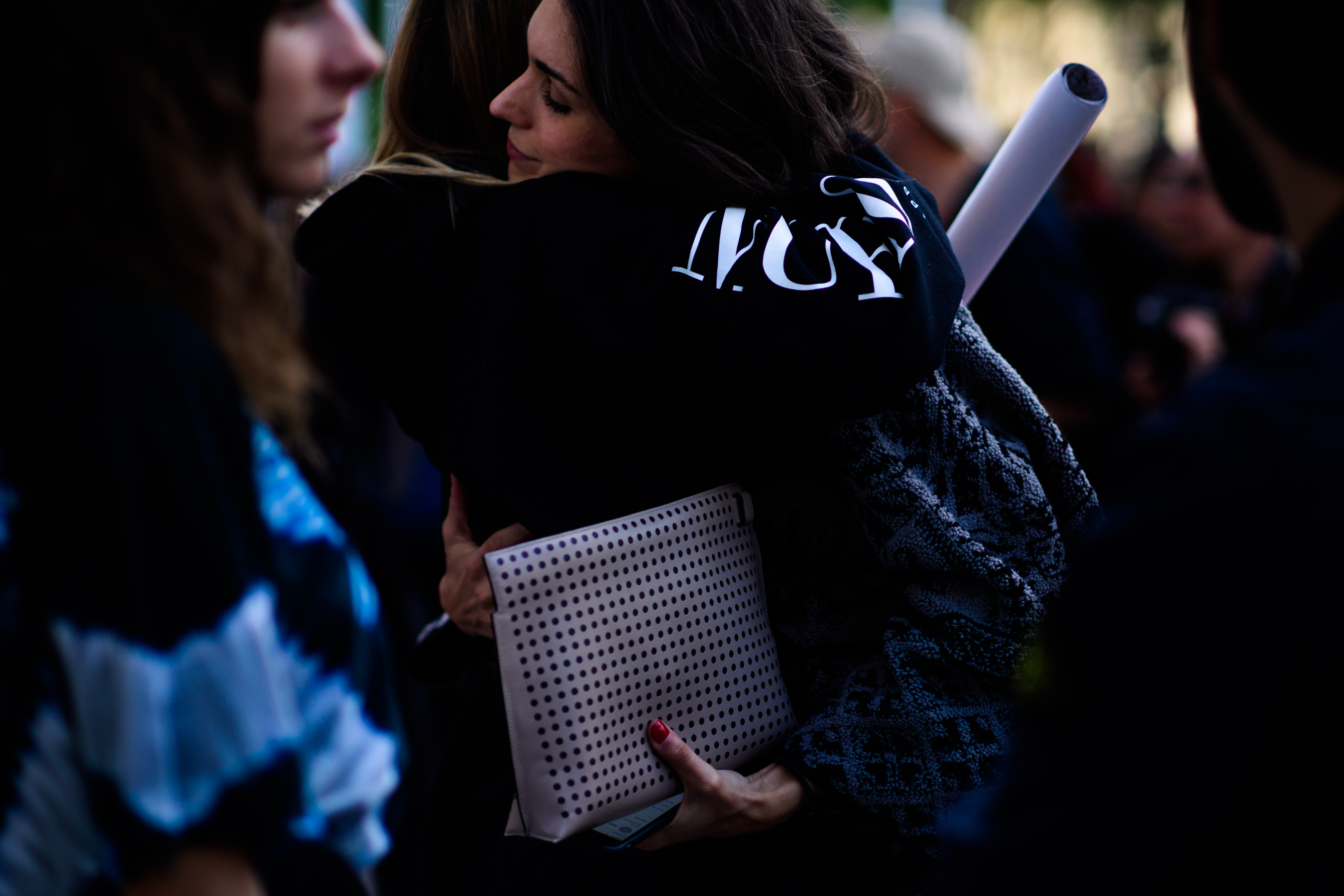 Two Italian girls hugging