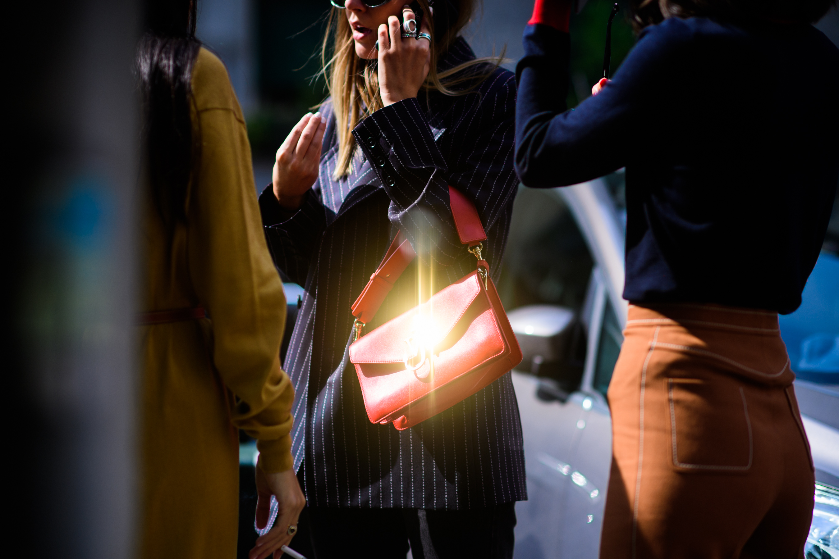Woman with red J.W.Anderson bag