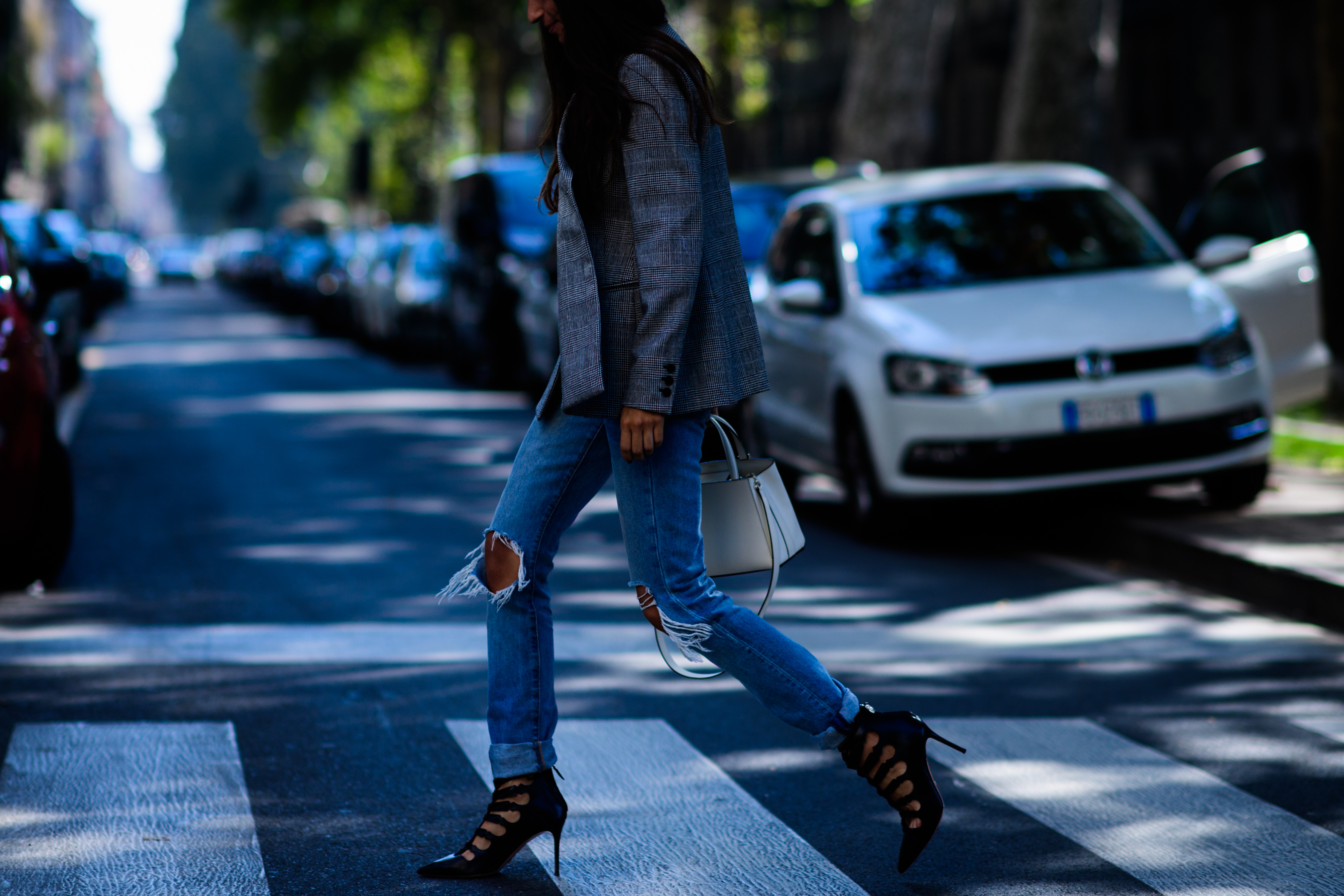 Italian stylist wearing blazer and denim