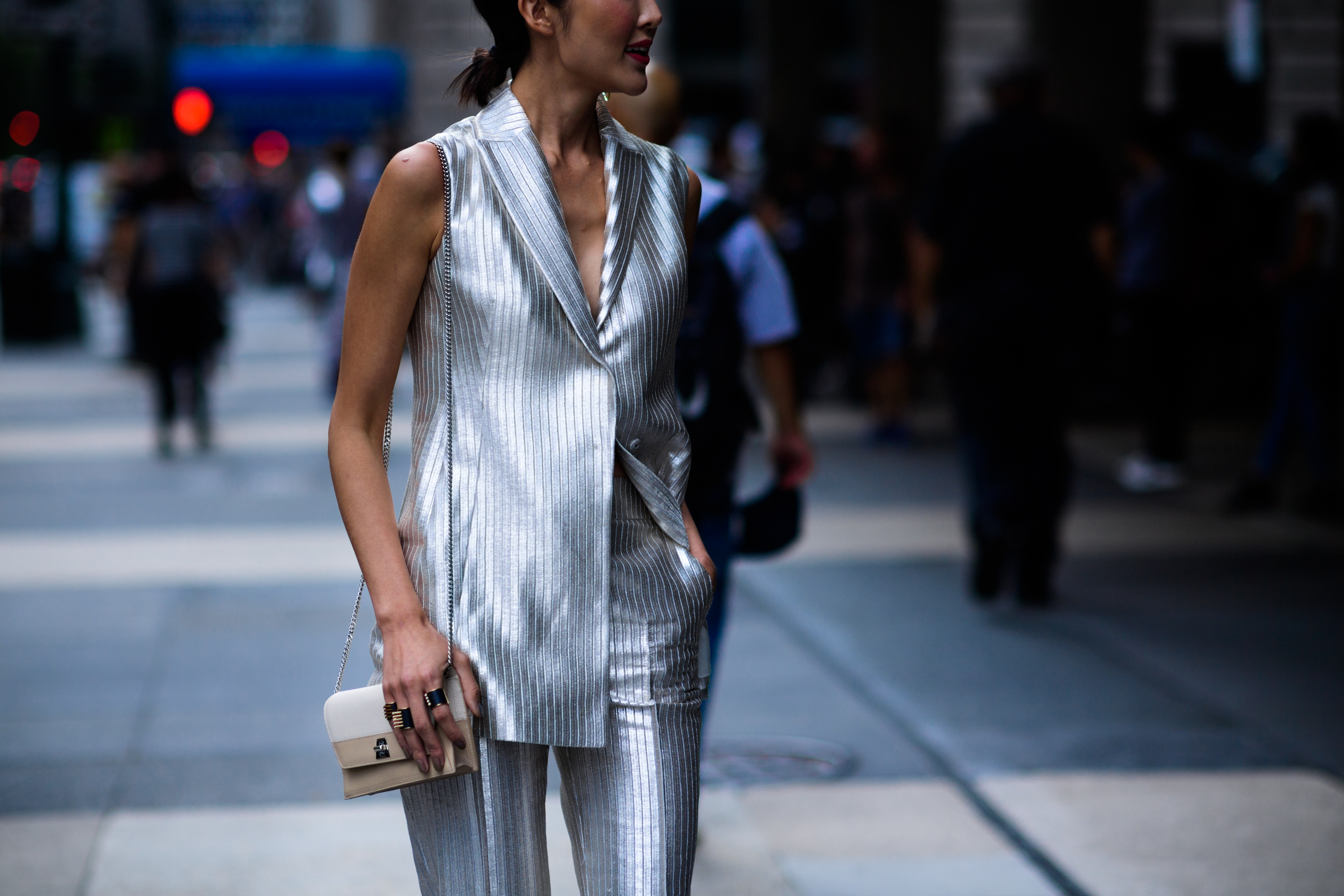 Woman wearing silver suit