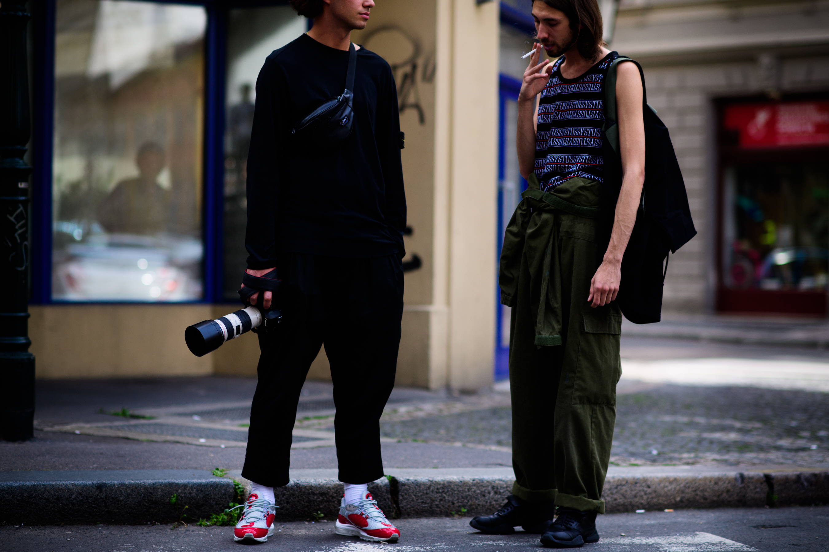 Two men smoking after the show