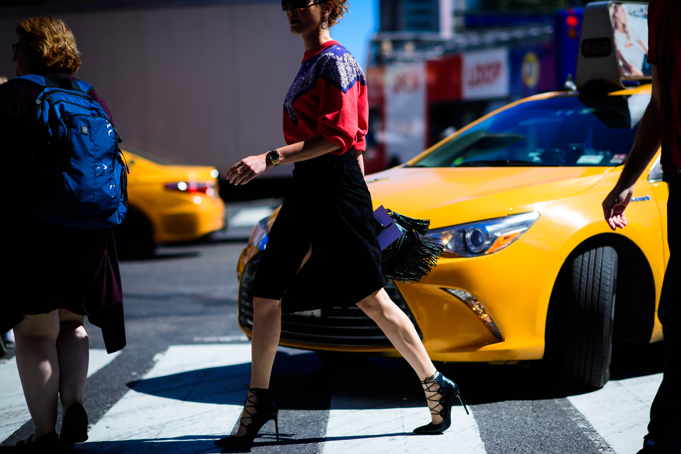 Turkish stylist wearing red top