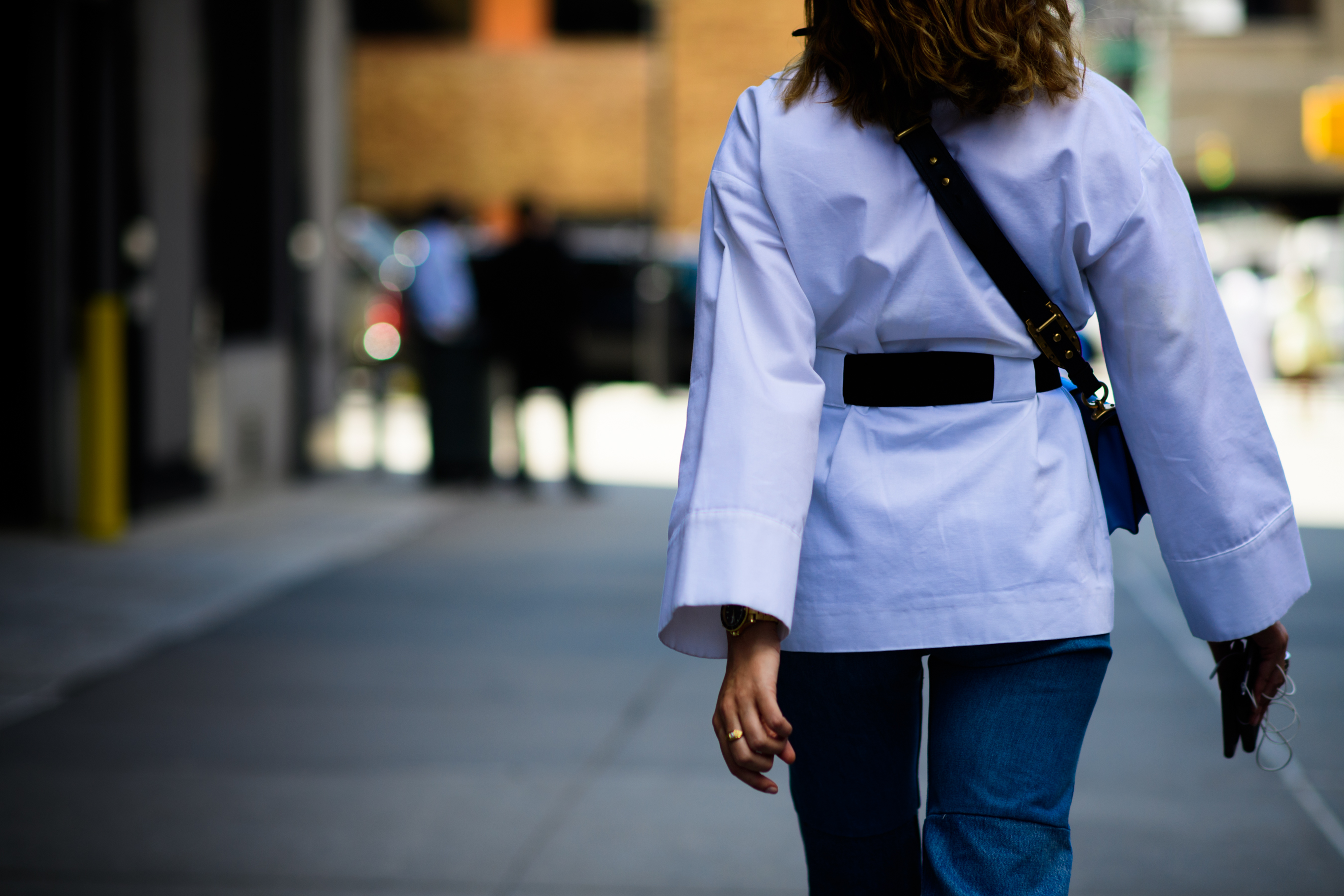 Turkish stylist wearing white top