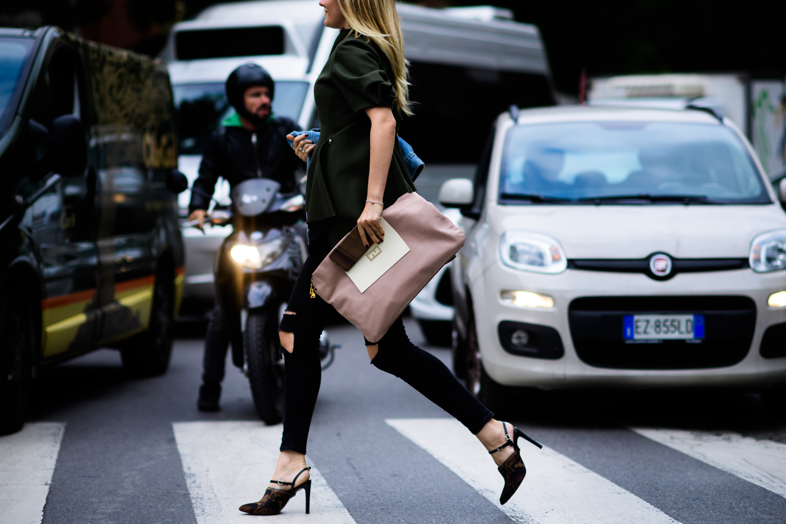 Russian stylist wearing green top