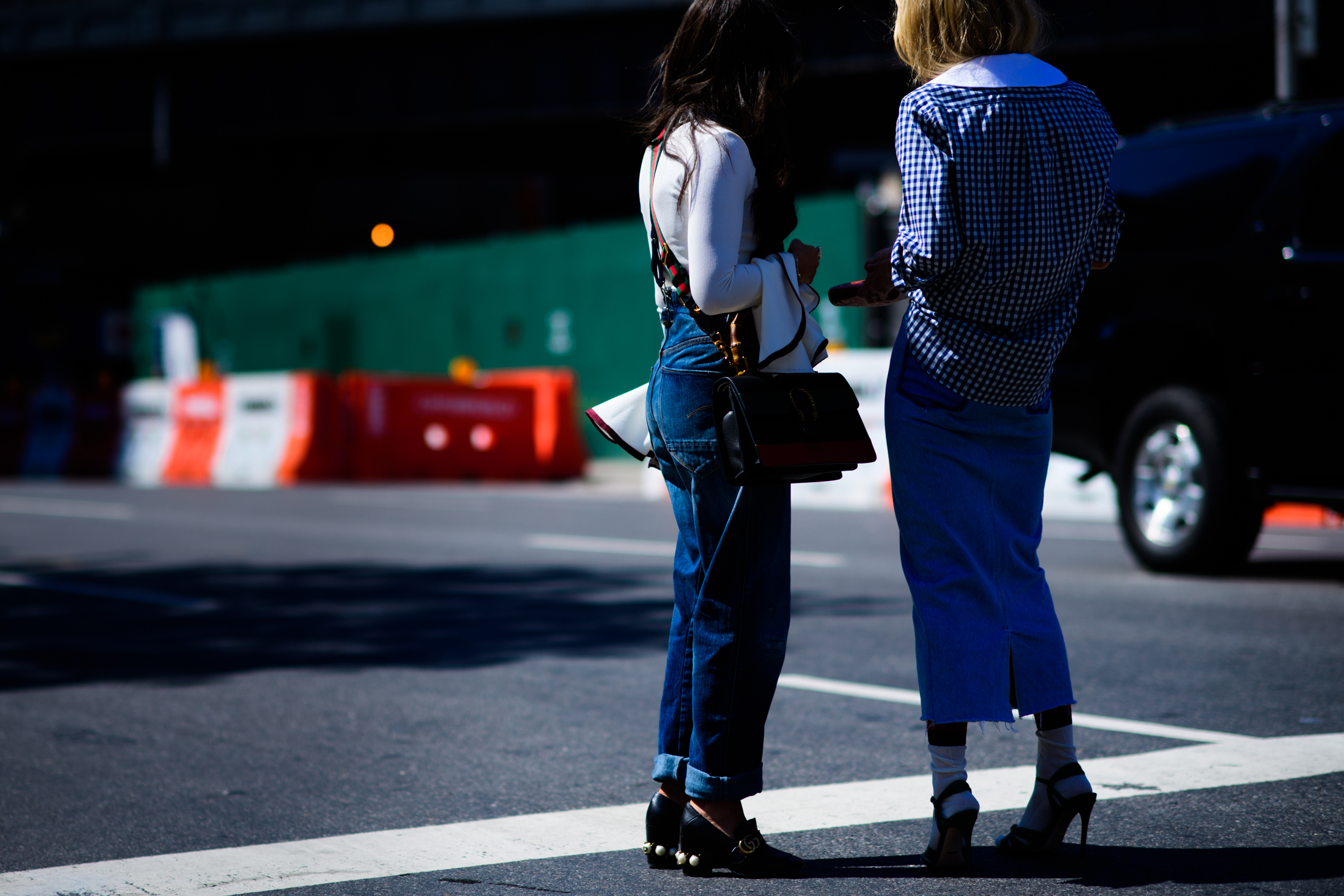 Two women wearing denim