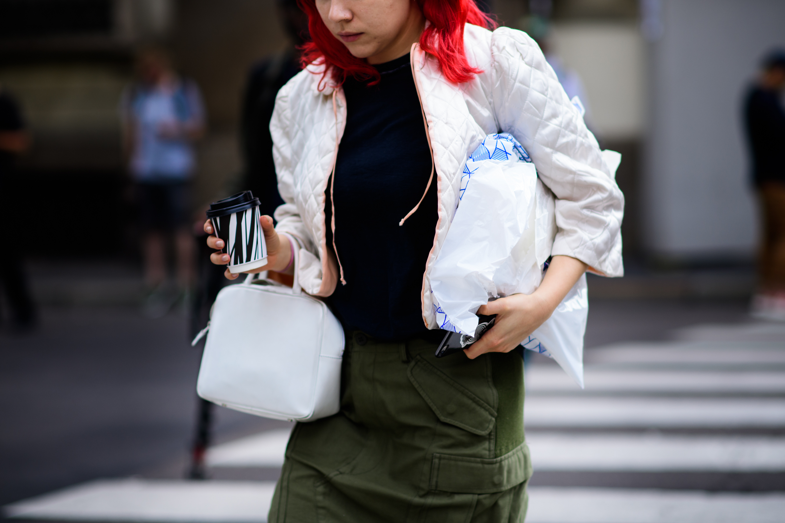 British stylist wearing white bomber