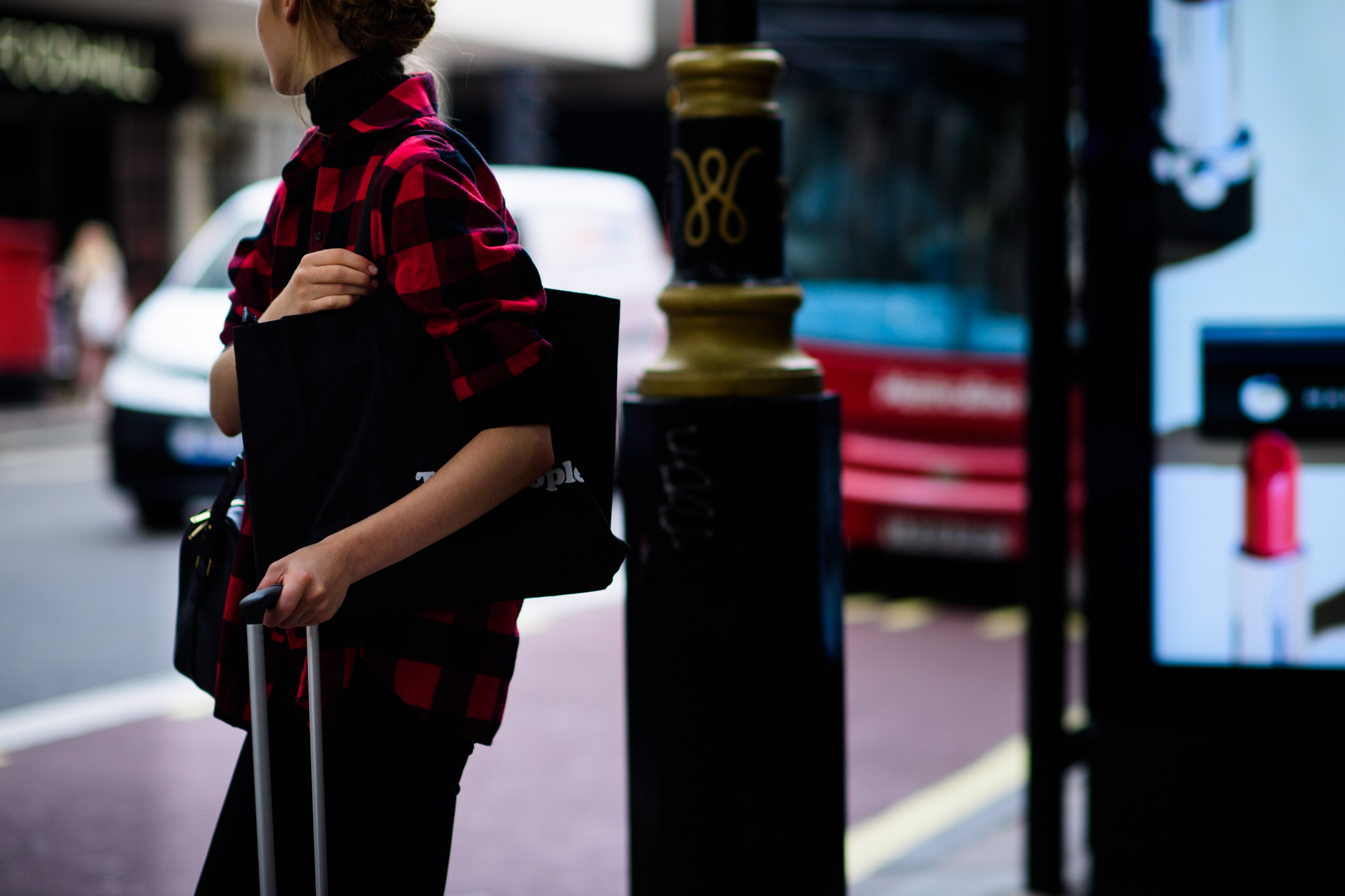 Woman wearing red check shirt