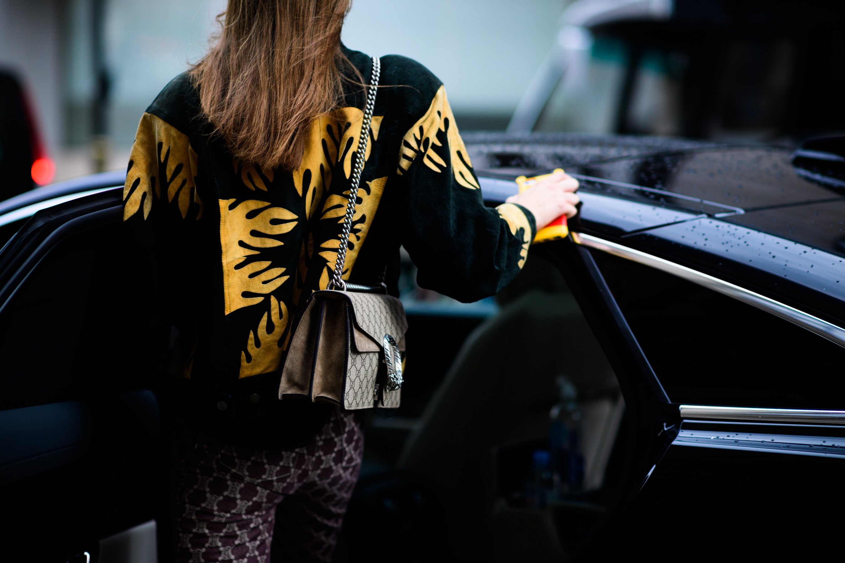 Woman with Gucci hand bag