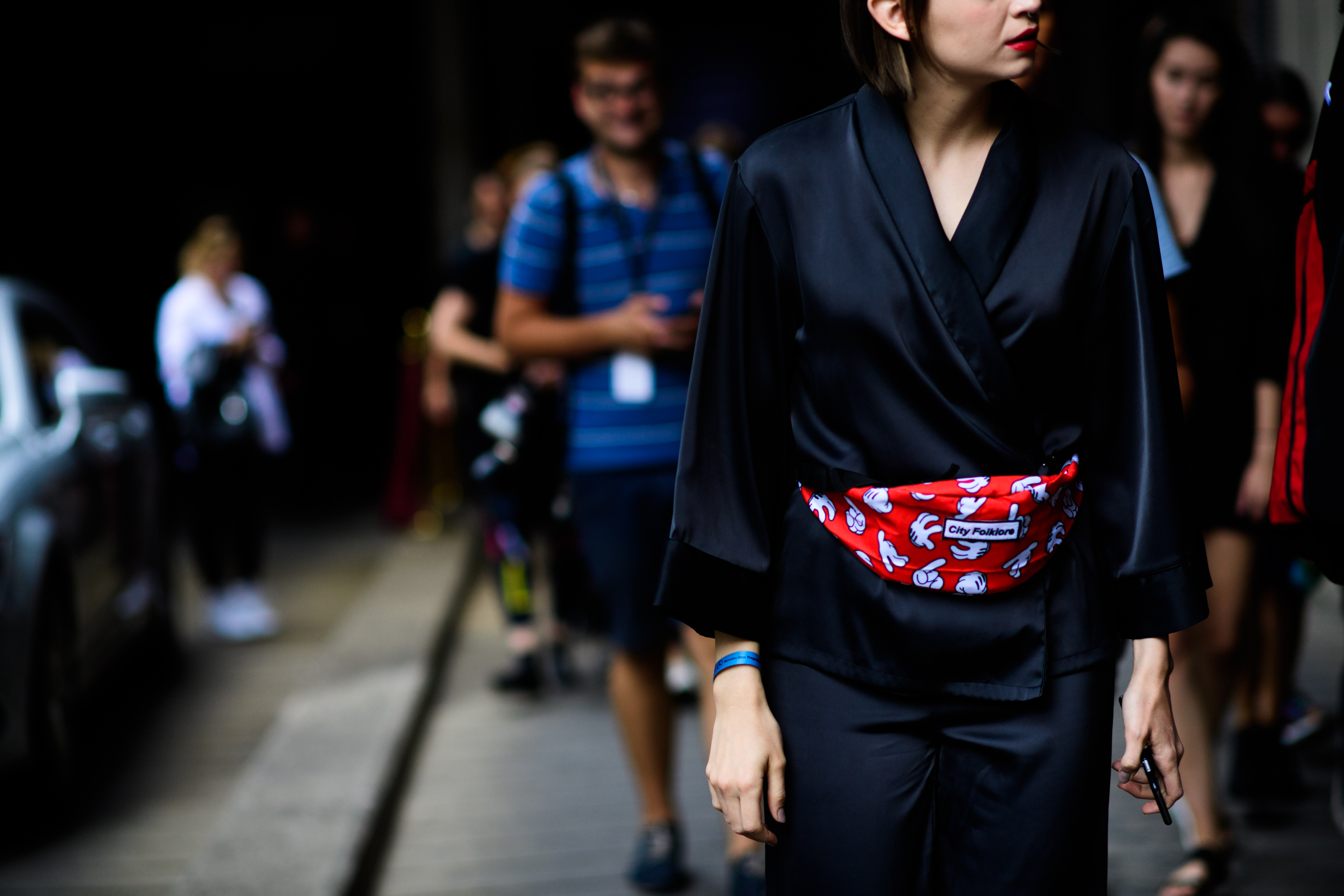Woman with red fanny pack