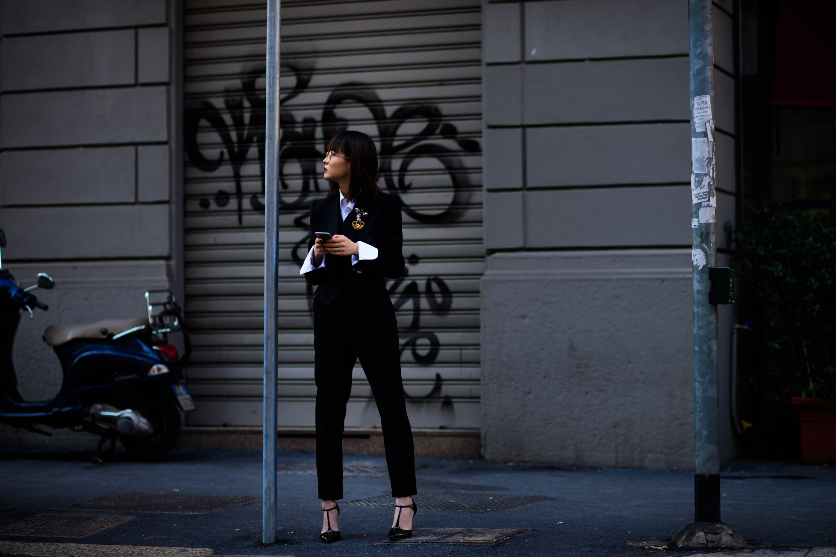 Woman wearing black formal suit