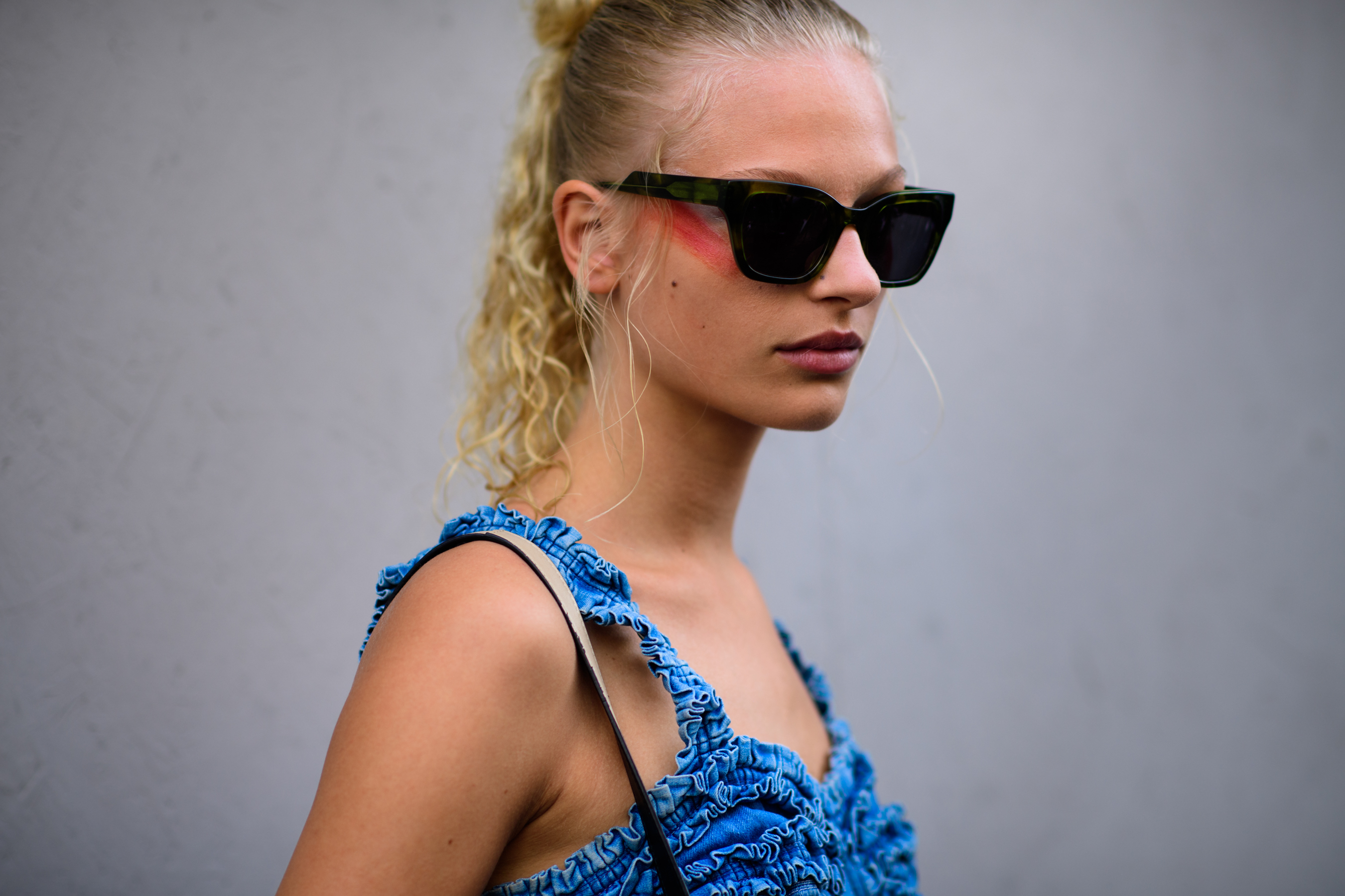 Danish model wearing denim and glasses