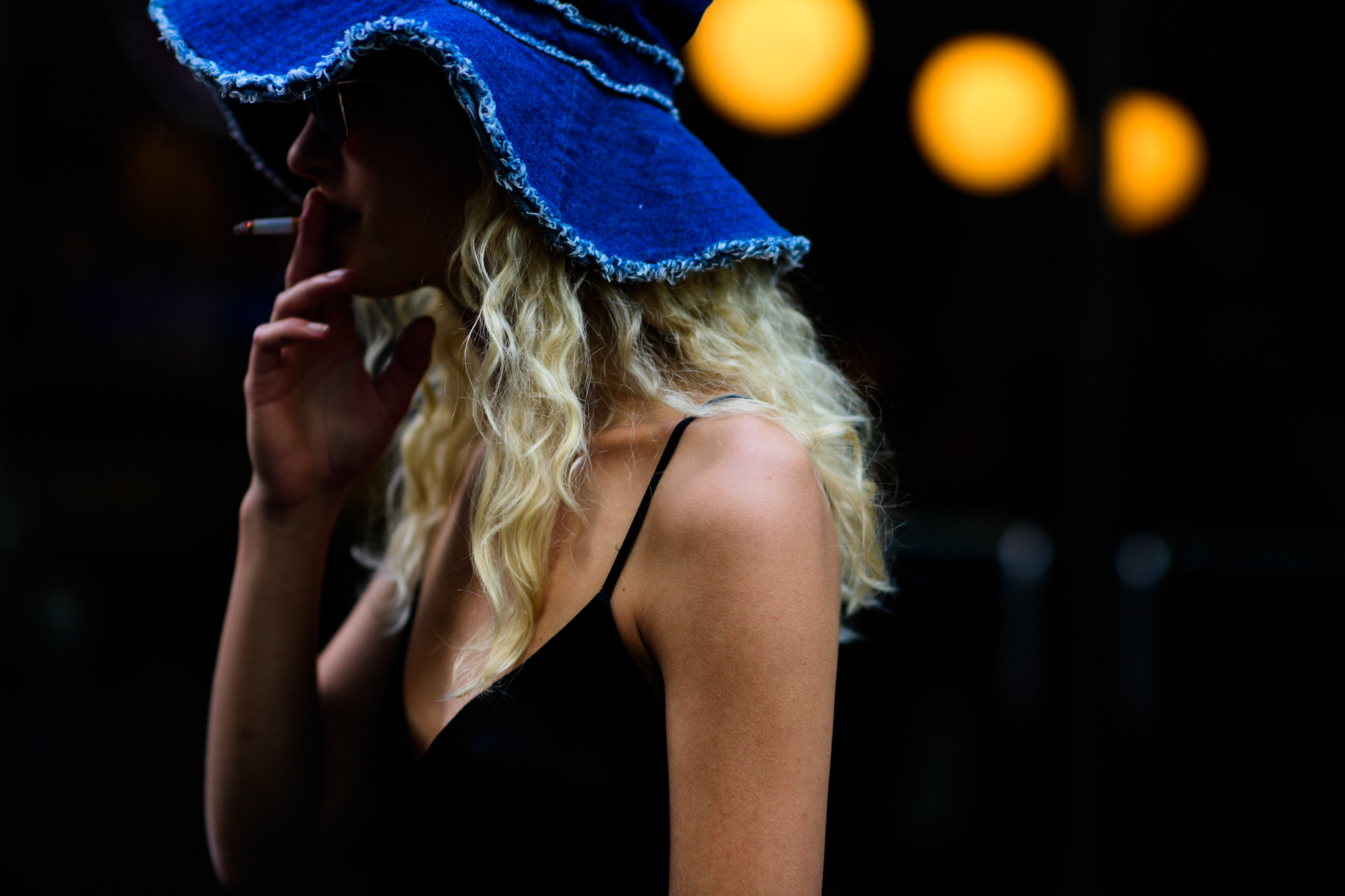 Danish model wearing denim hat