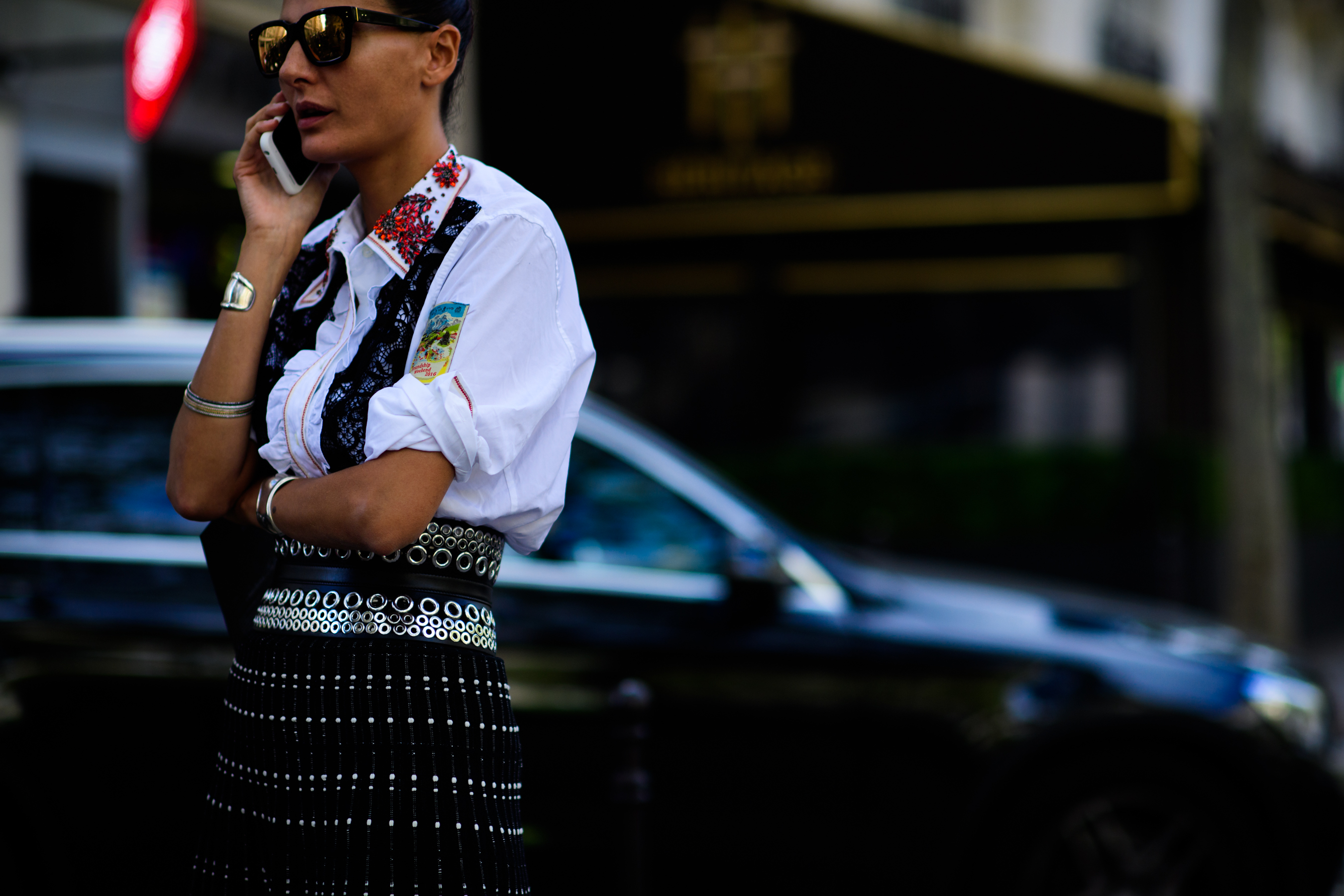 Italian stylist wearing metal detail skirt