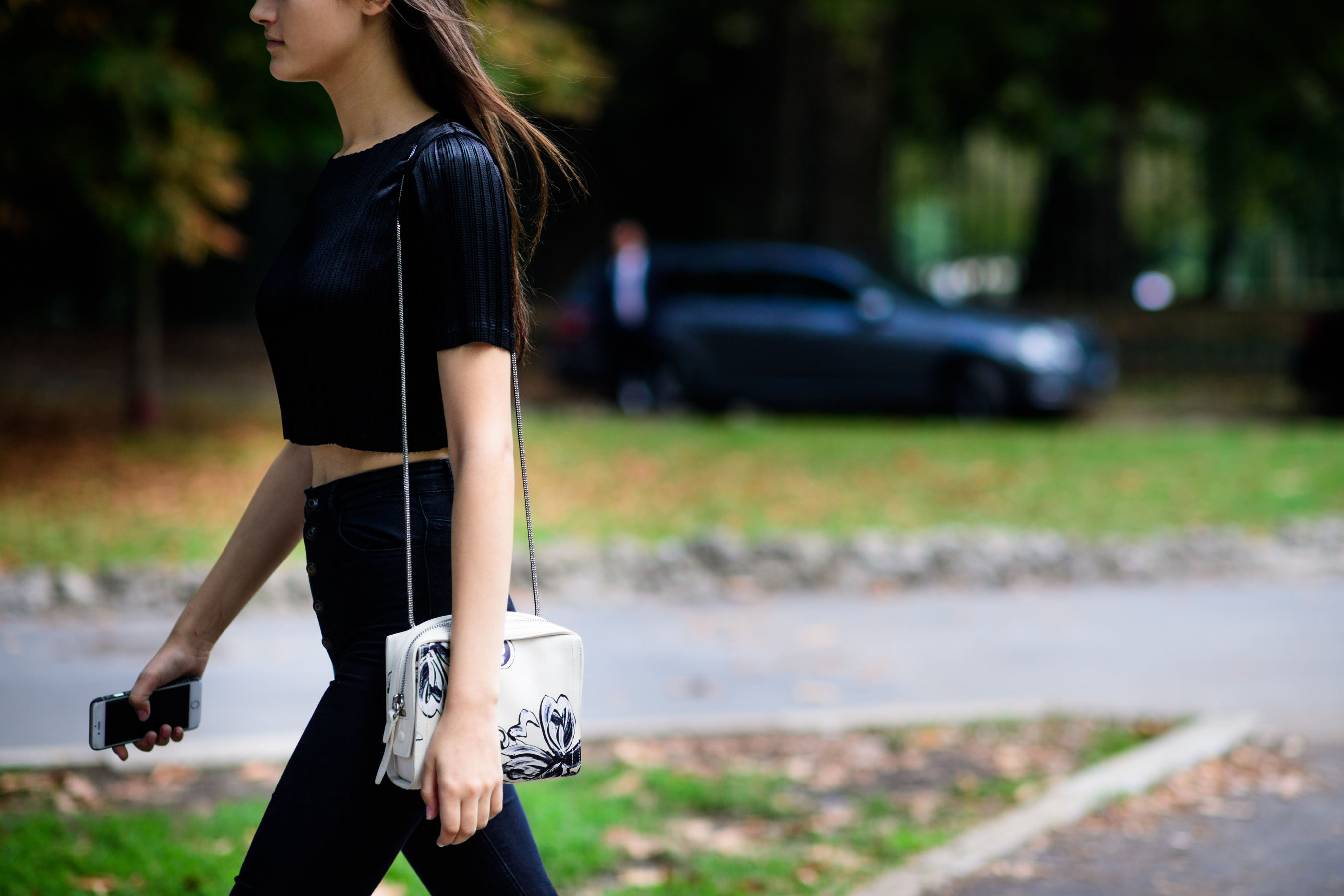 Model with floral bag