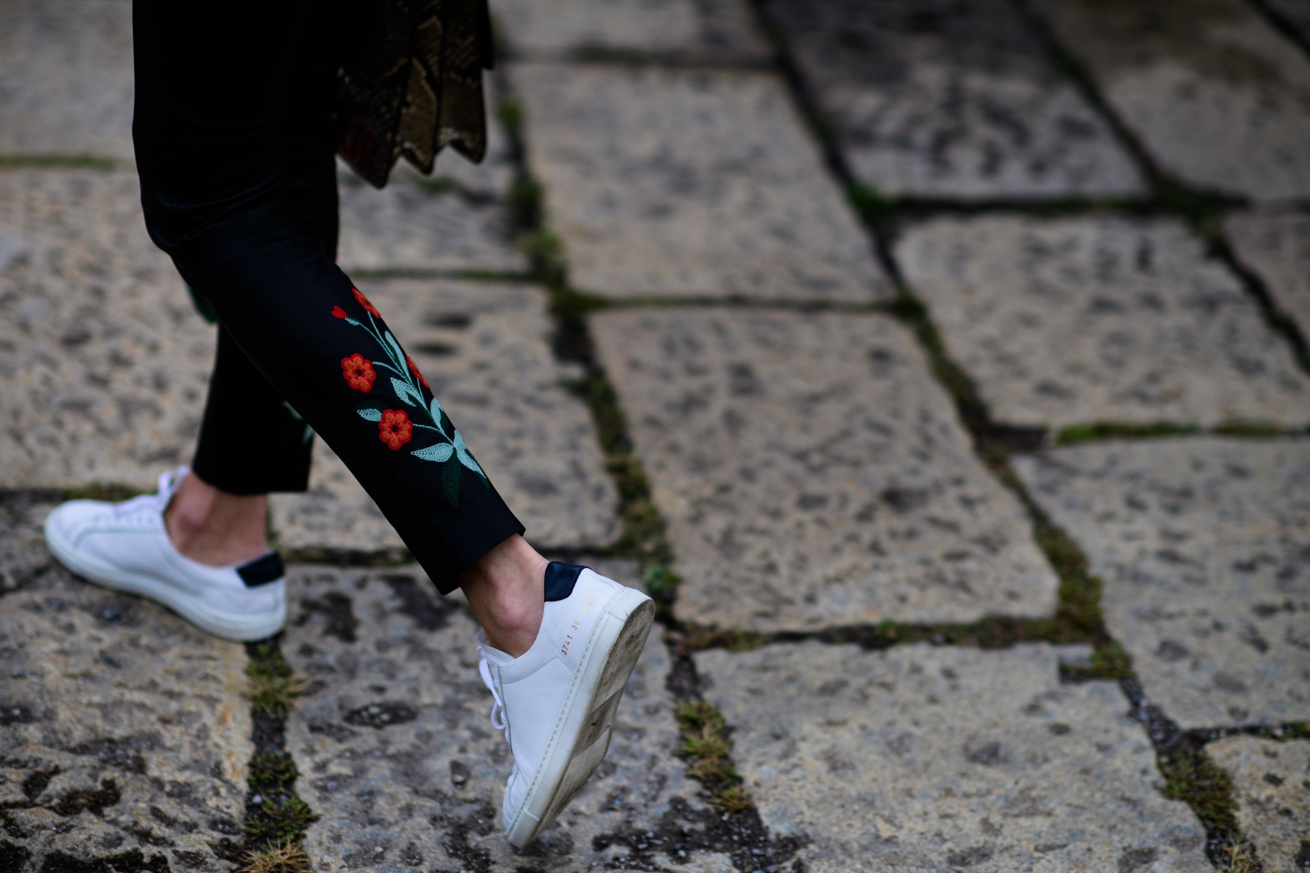 Woman wearing embroidered pants