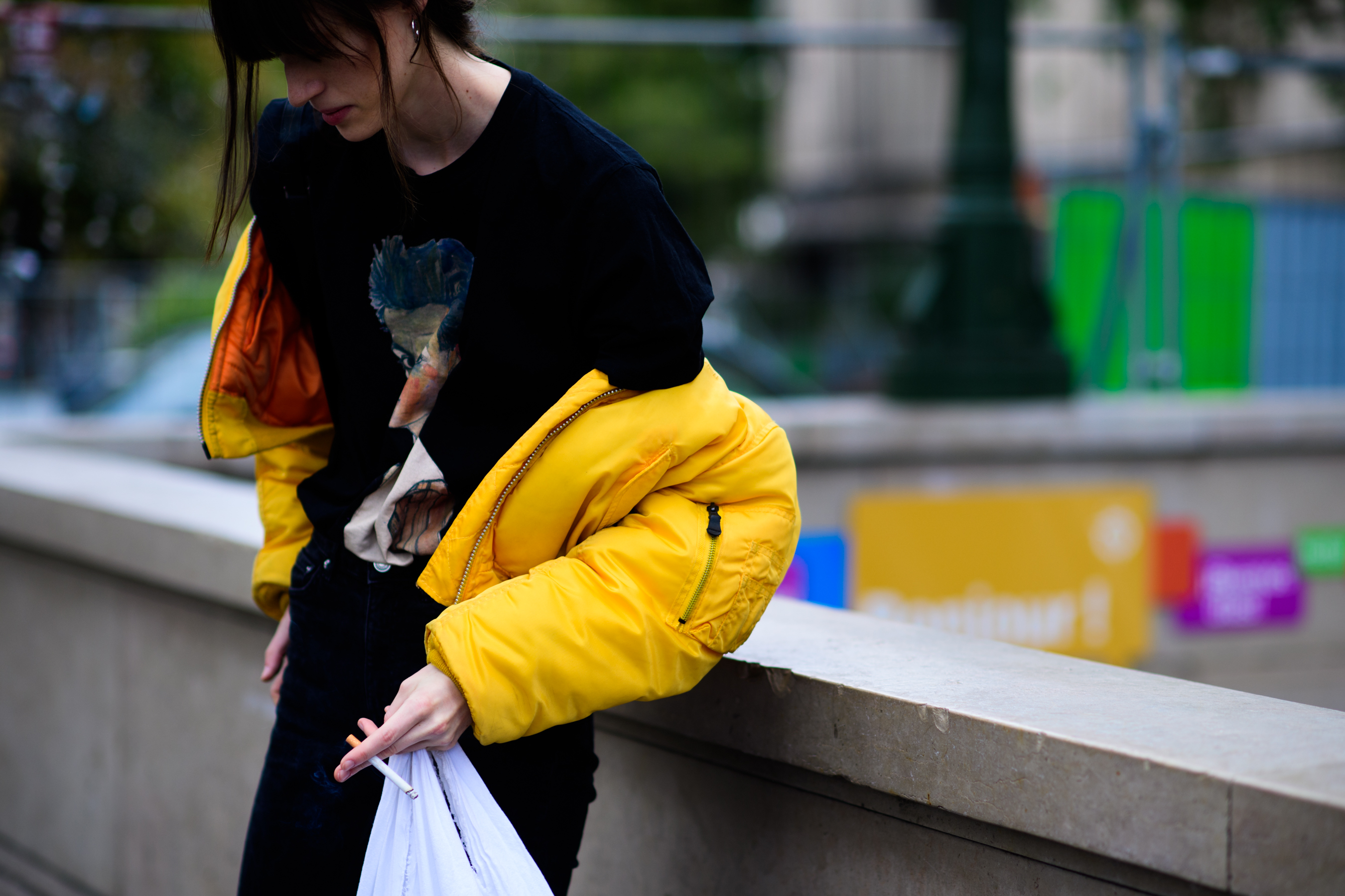 Model wearing yellow bomber