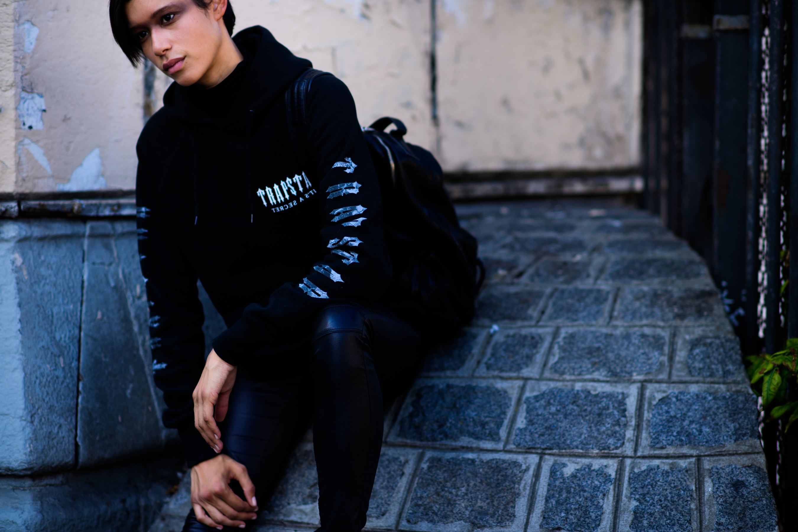 Model wearing Trapsta hoodie after the show