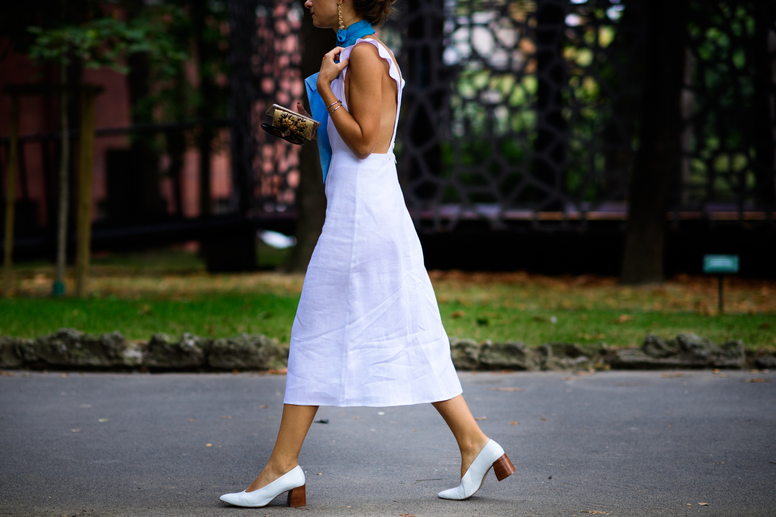 American illustrator wearing white dress