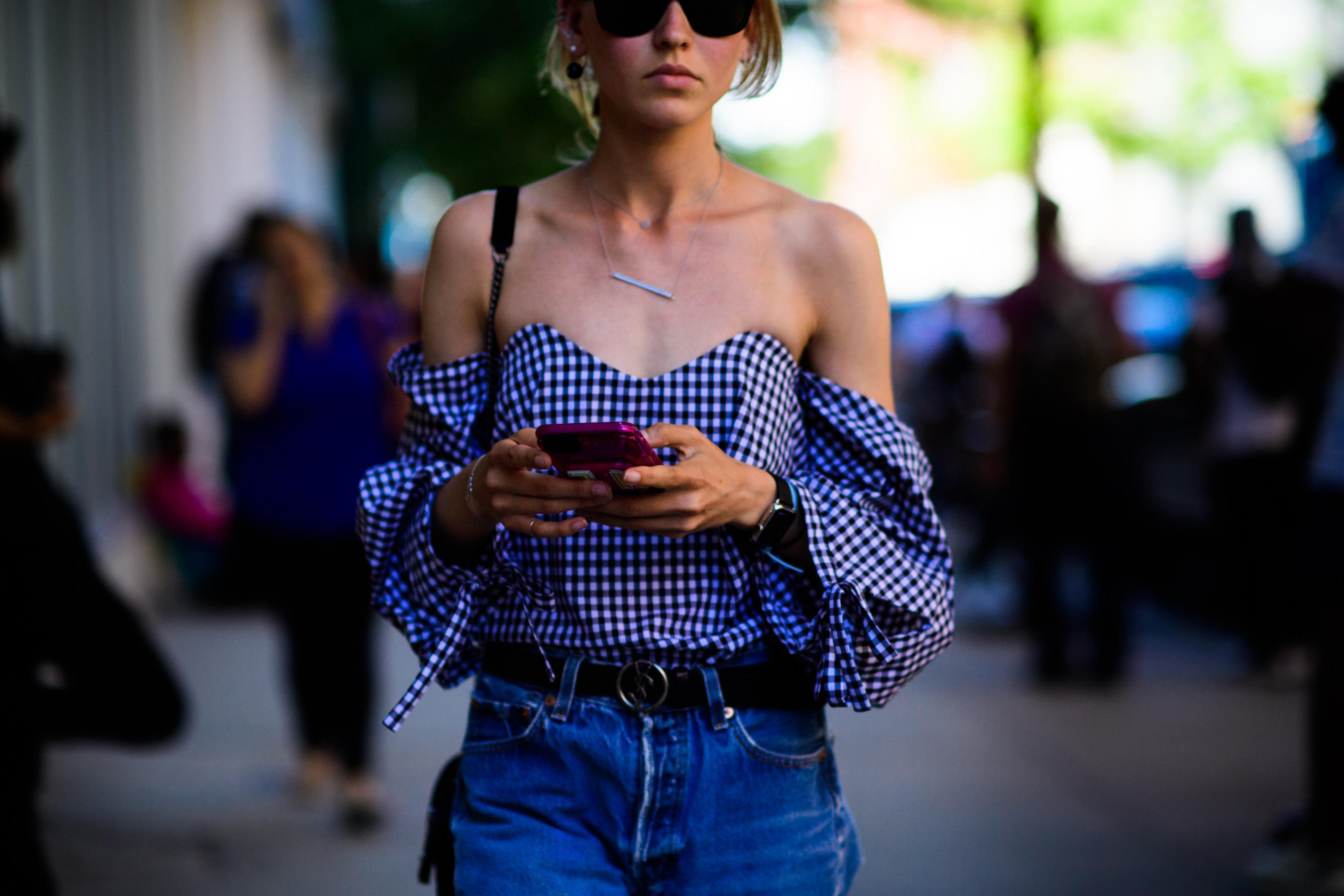 Woman wearing shoulderless top