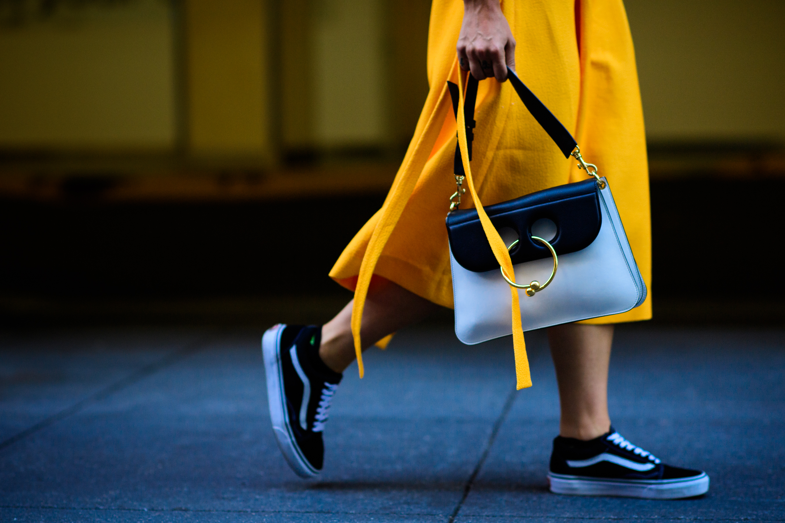 Editor wearing Vans and J.W.Anderson bag